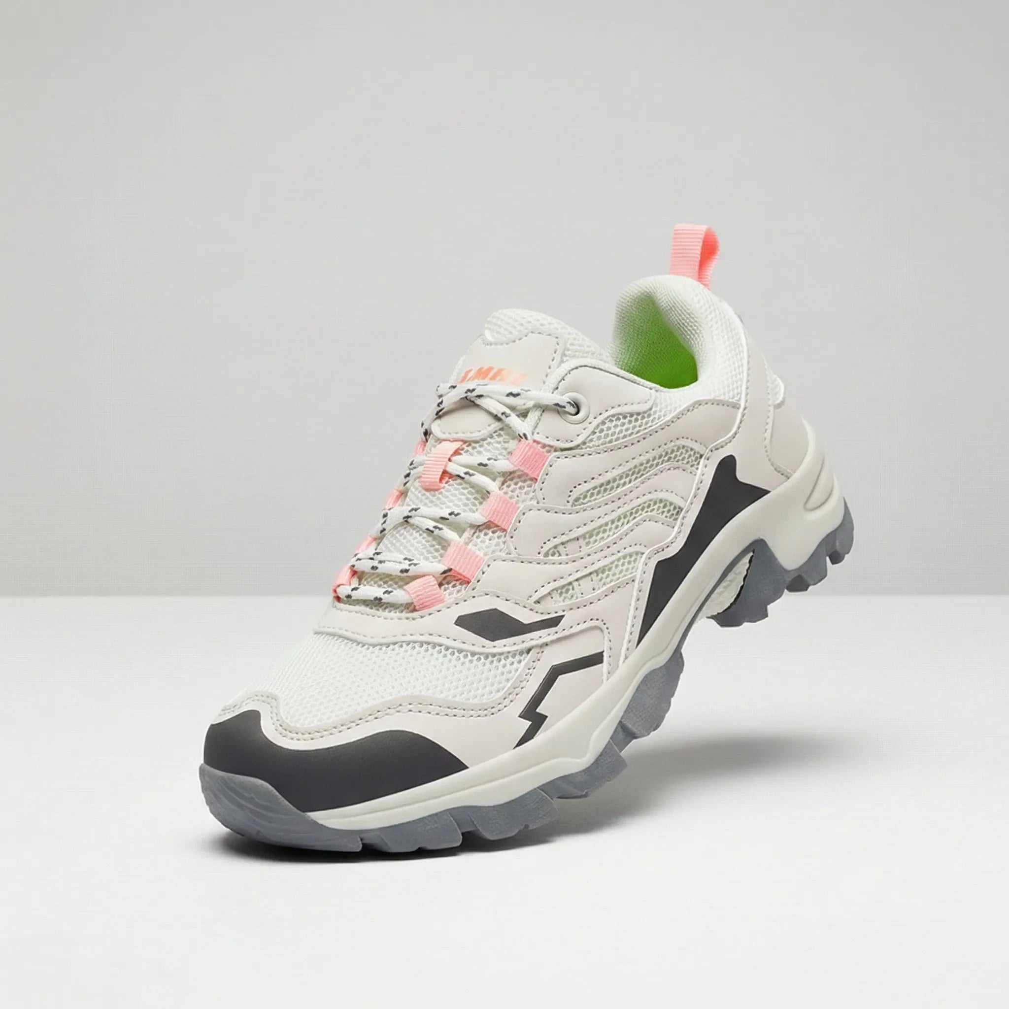 Women's waterproof hiking shoe with ankle support and tread pattern