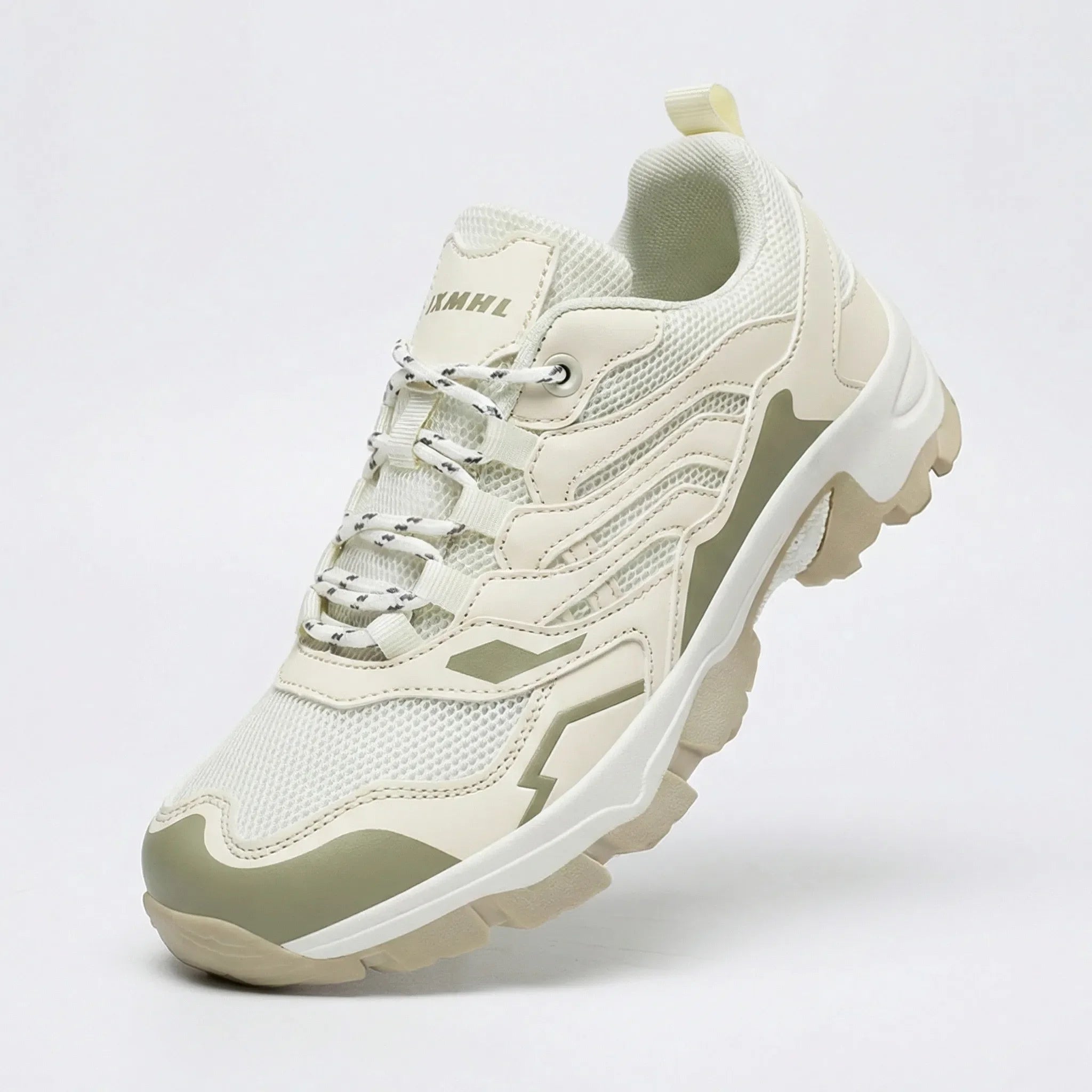 Women's waterproof hiking shoe with ankle support and tread pattern