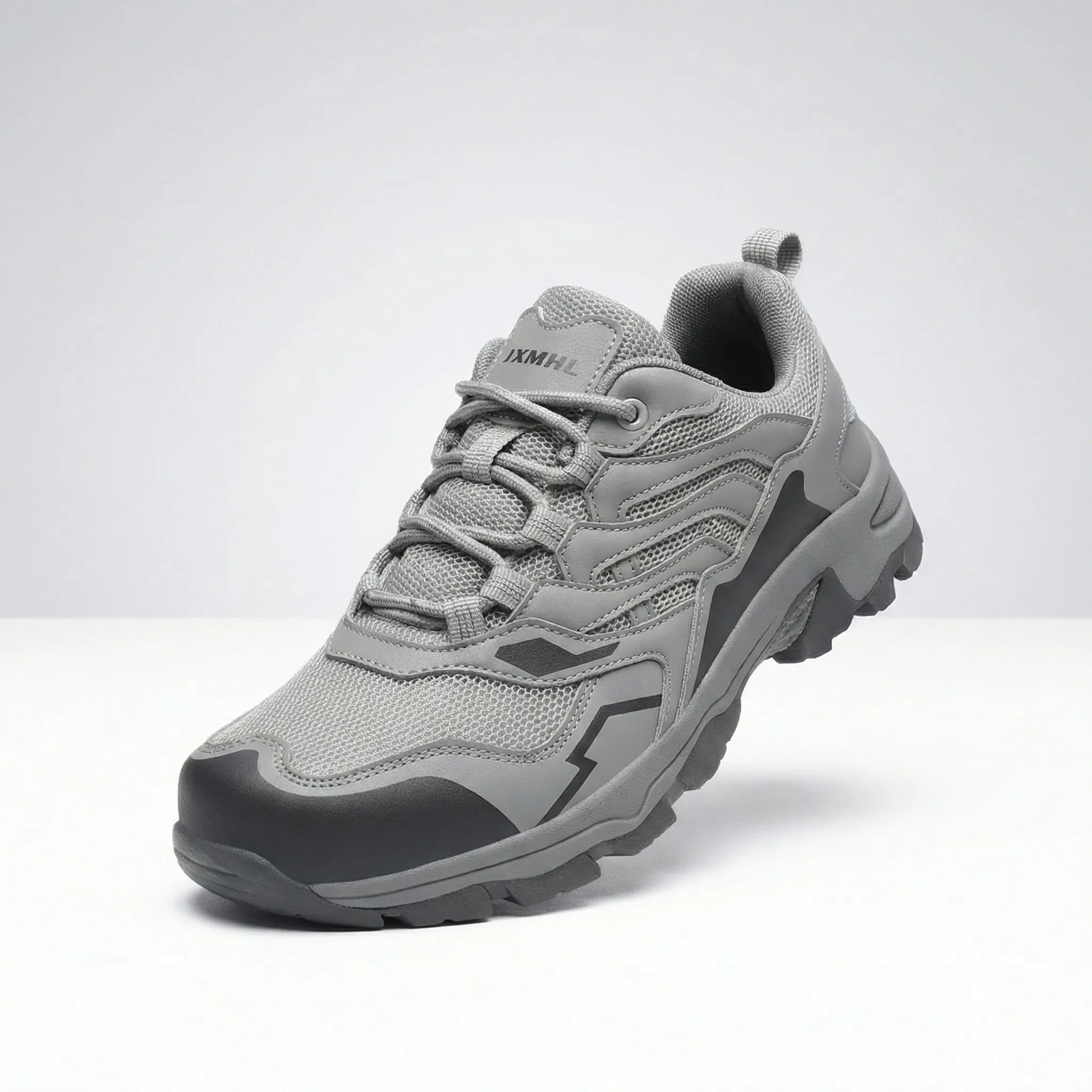 Women's waterproof hiking shoe with ankle support and tread pattern