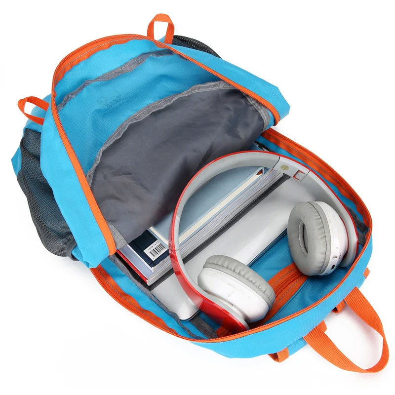 Packable daypack with water-repellent finish and breathable mesh straps
