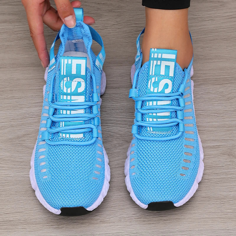Low profile running shoe with breathable knit upper and padded sole
