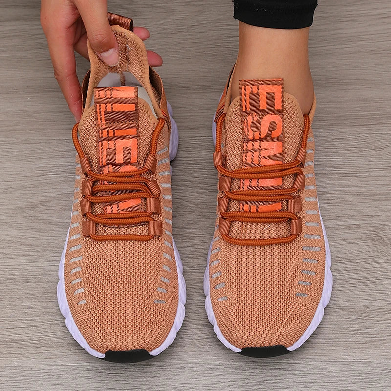Low profile running shoe with breathable knit upper and padded sole
