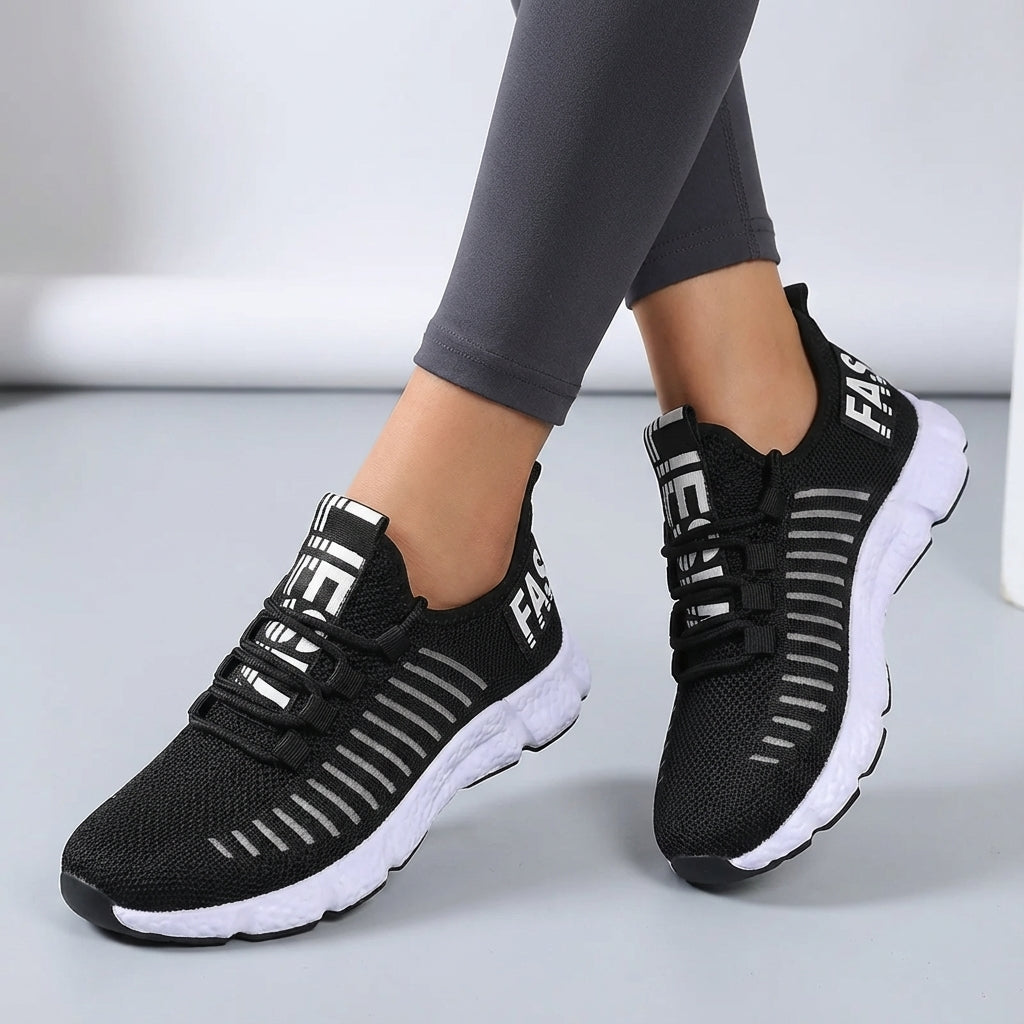 Low profile running shoe with breathable knit upper and padded sole