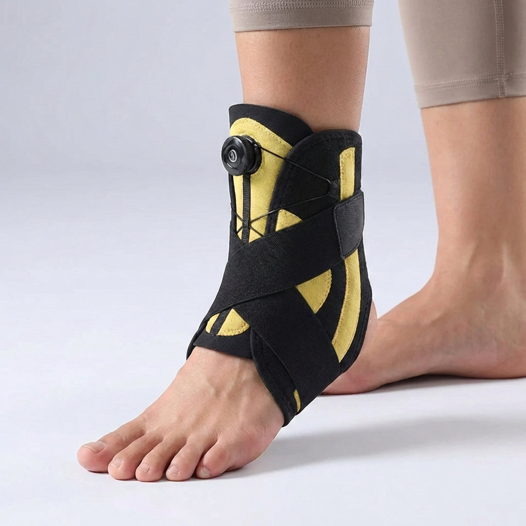 Adjustable ankle support with compression dial and lateral stabilizers