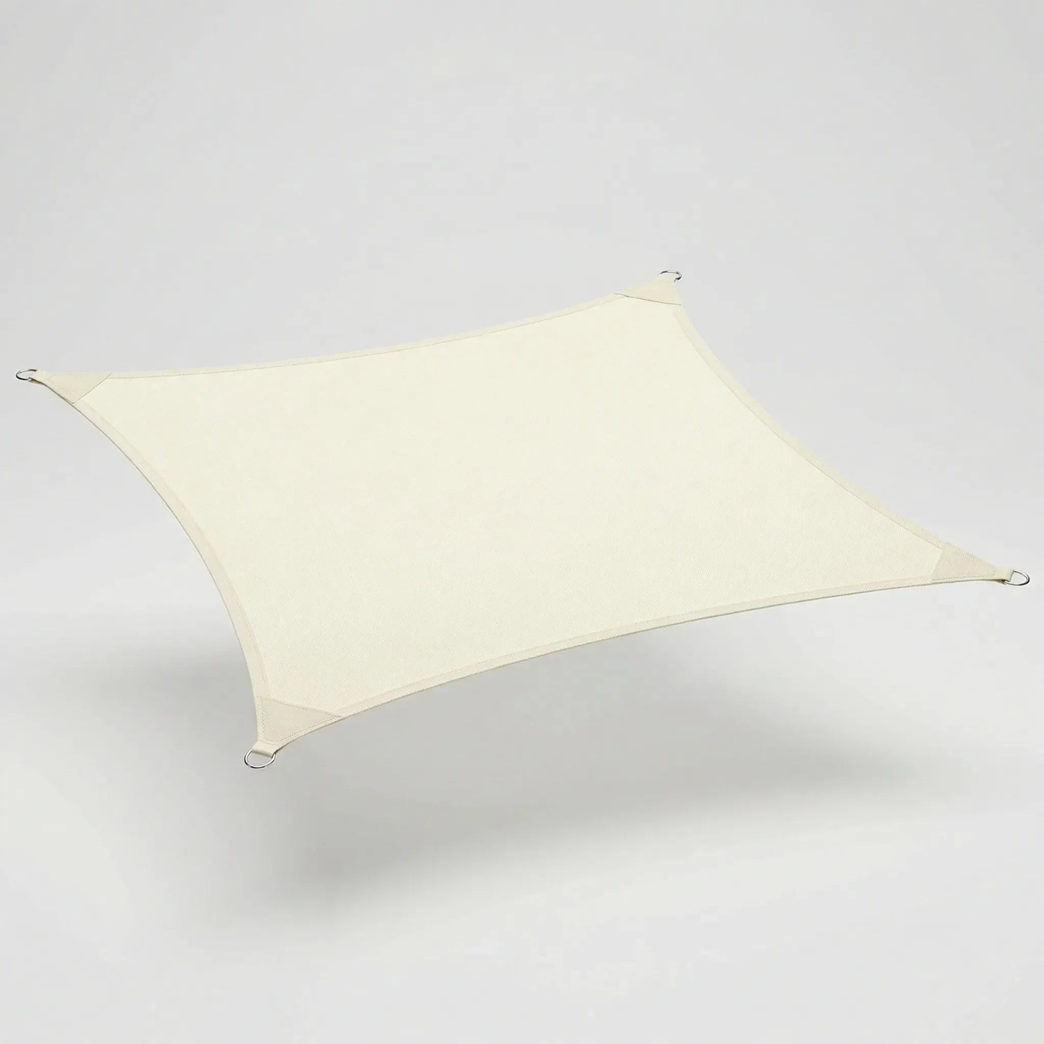 Large rectangular shade sail with reinforced corners and breathable polyester weave