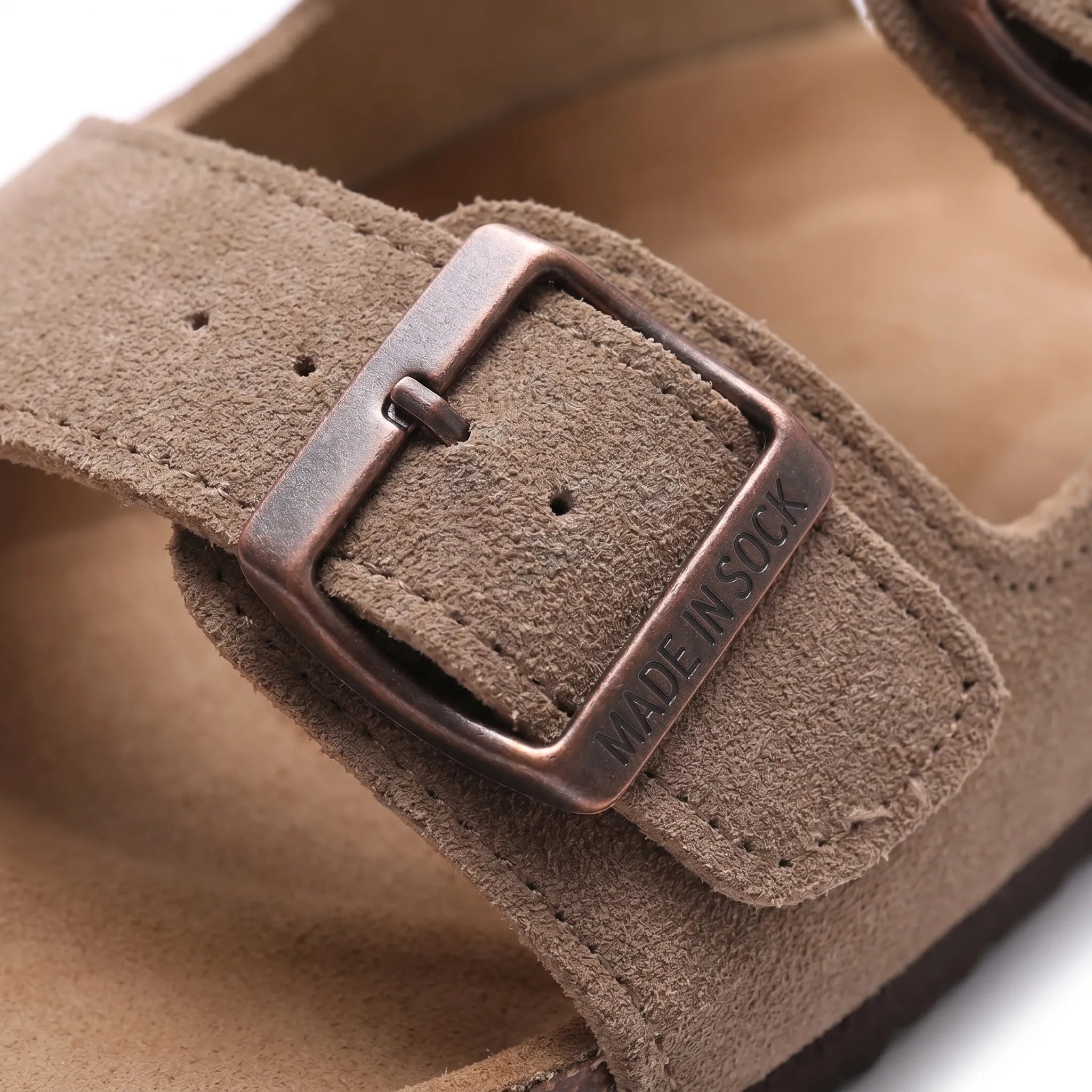 Two-strap slip-on sandals with adjustable buckles and open toe