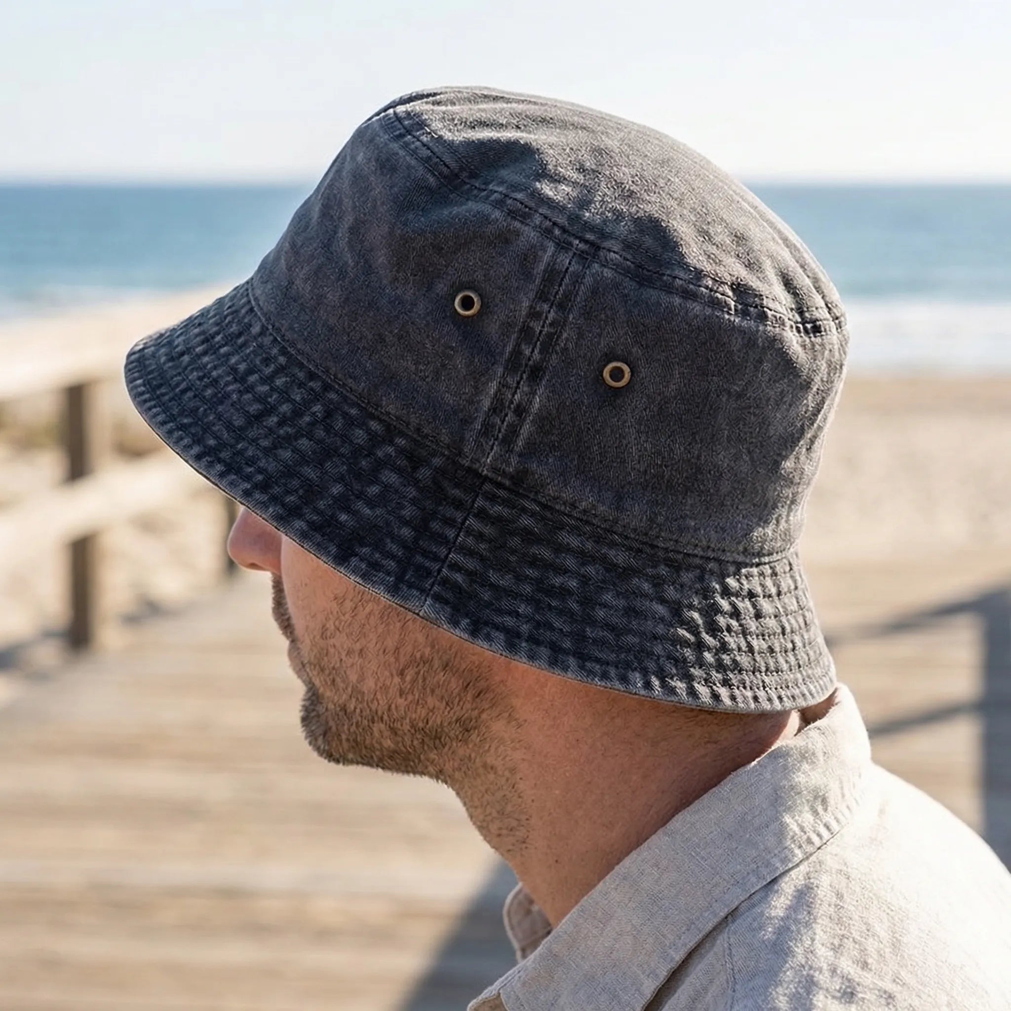 Unisex bucket hat with wide brim for sun protection, packable washed cotton