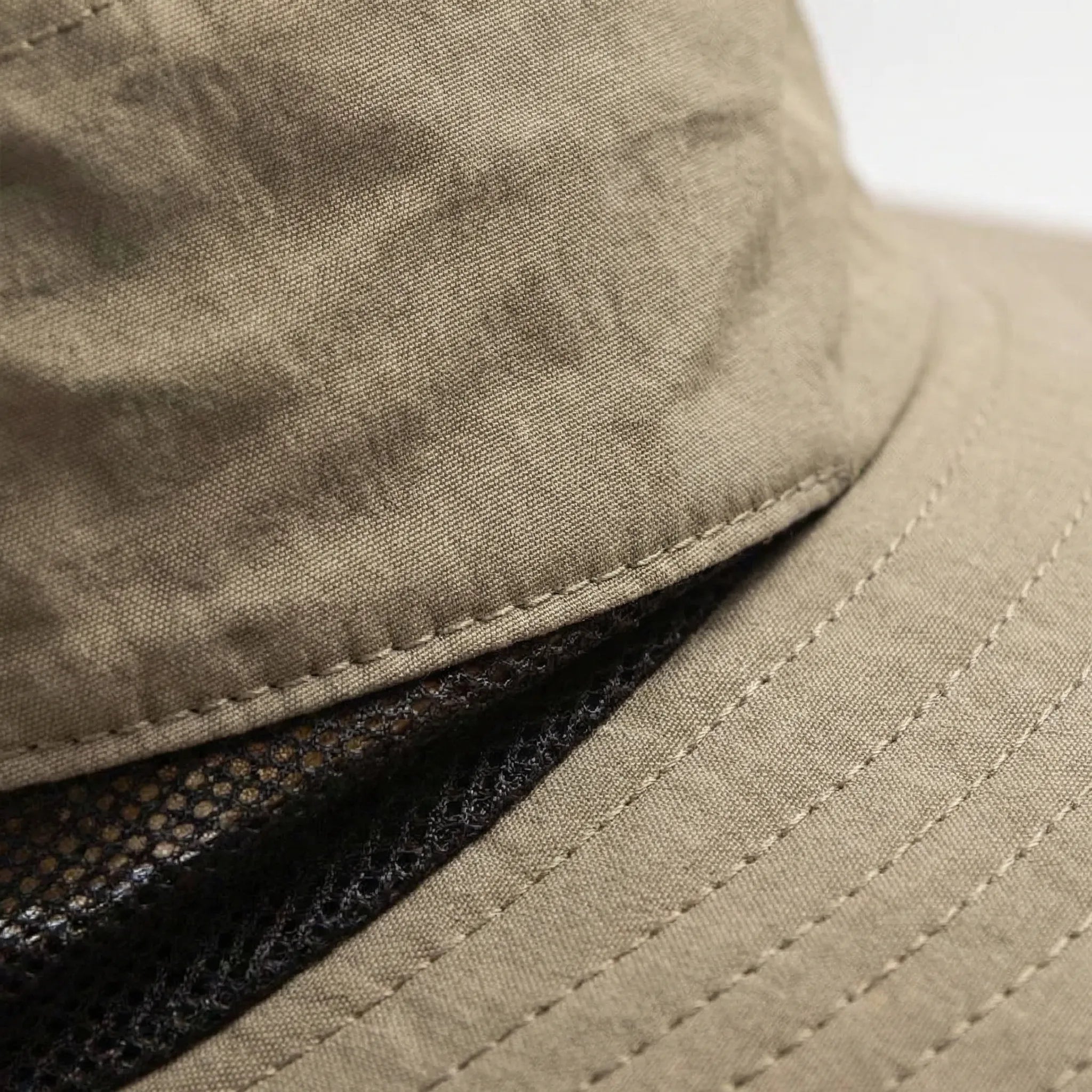 Wide-brim sun hat with foldable mesh neck flap and adjustable chin cord