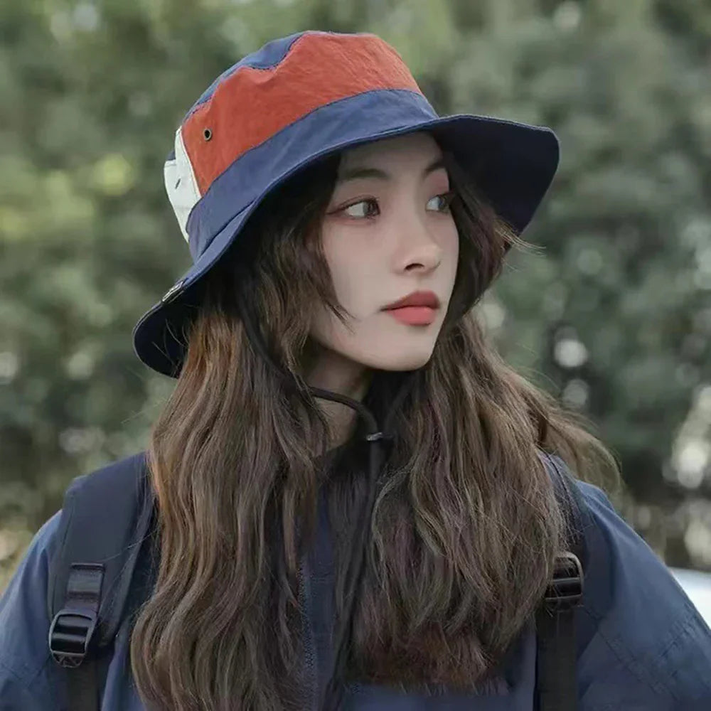 Wide-brim bucket hat with quick-dry fabric and UV protection