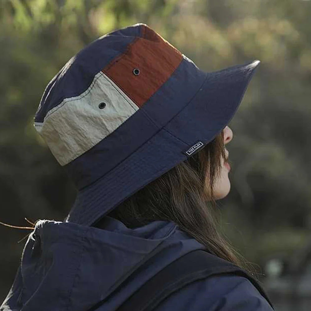 Wide-brim bucket hat with quick-dry fabric and UV protection