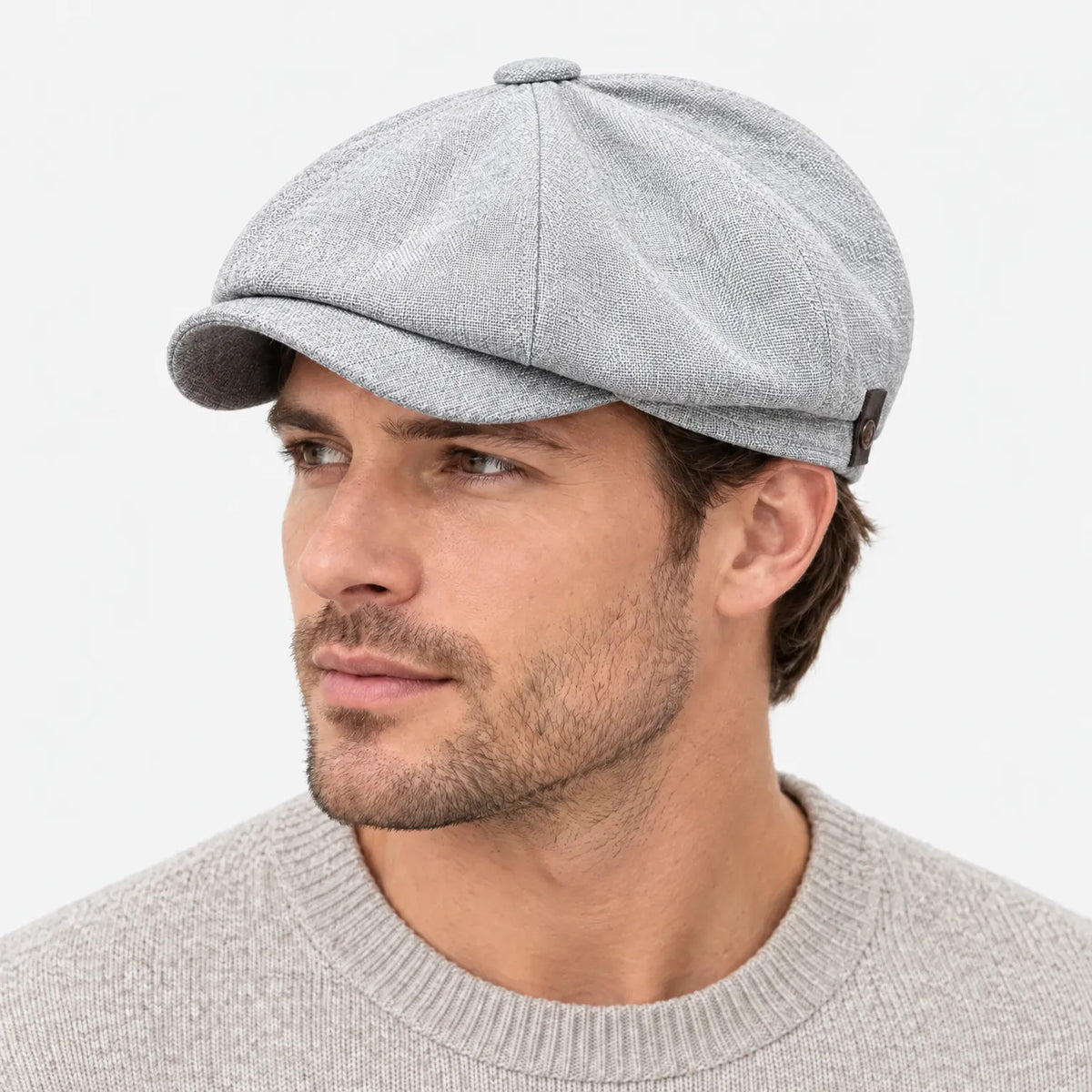 Eight-panel driver's cap with herringbone pattern and short bill