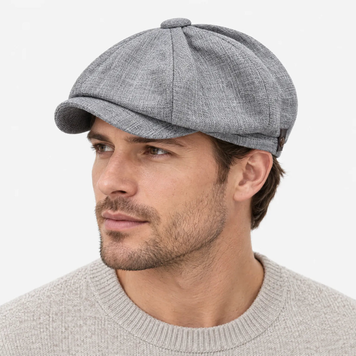 Eight-panel driver's cap with herringbone pattern and short bill