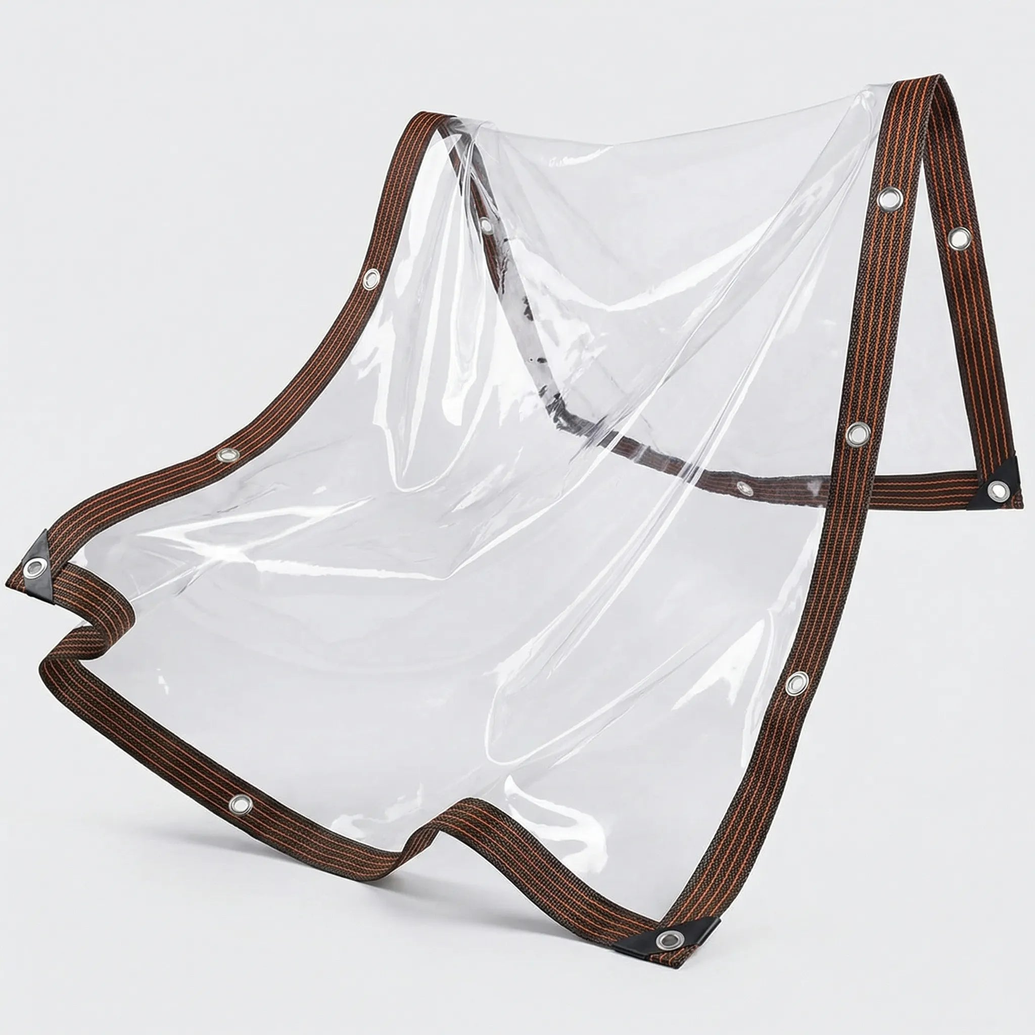 Transparent weather shield with clear light transmission and reinforced eyelets