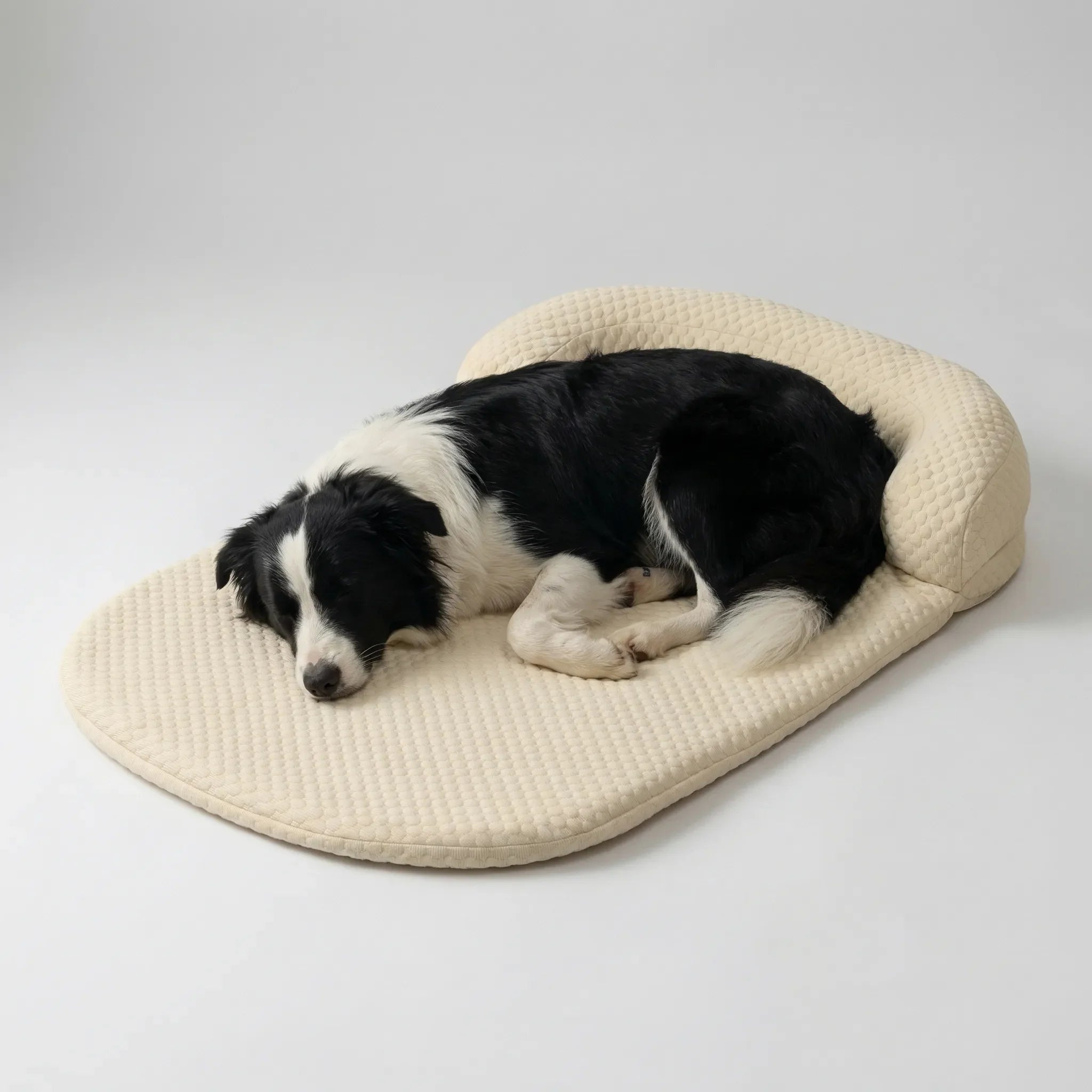 Cooling pet bed with foam base, removable washable cover and bolster headrest