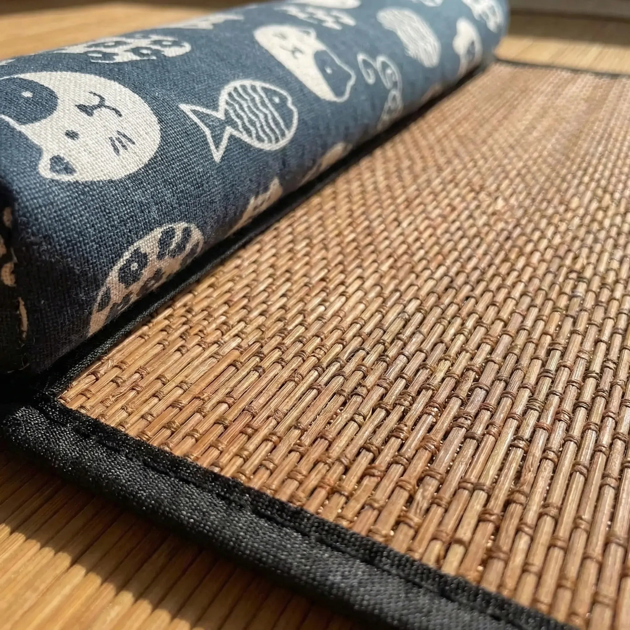 Woven rattan cooling mat with attached bolster pillow for cats and small dogs