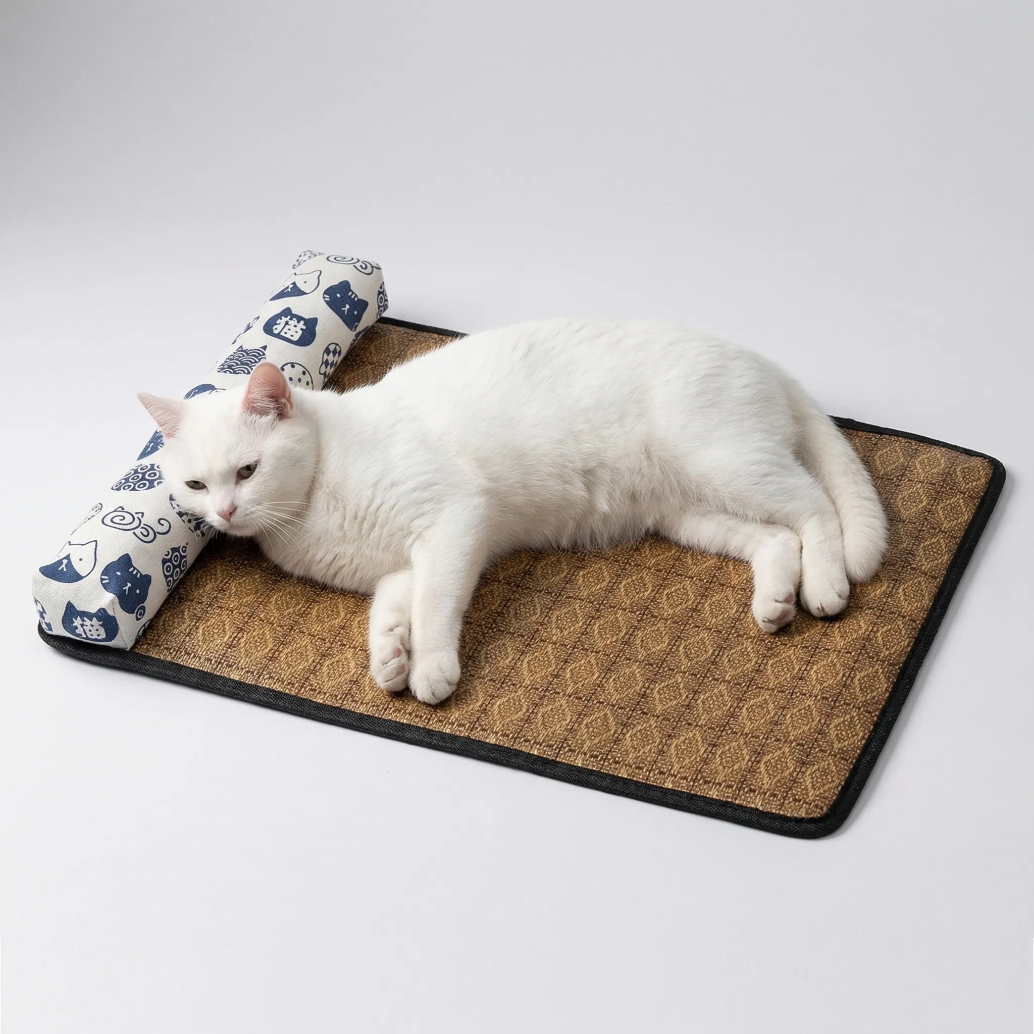 Woven rattan cooling mat with attached bolster pillow for cats and small dogs