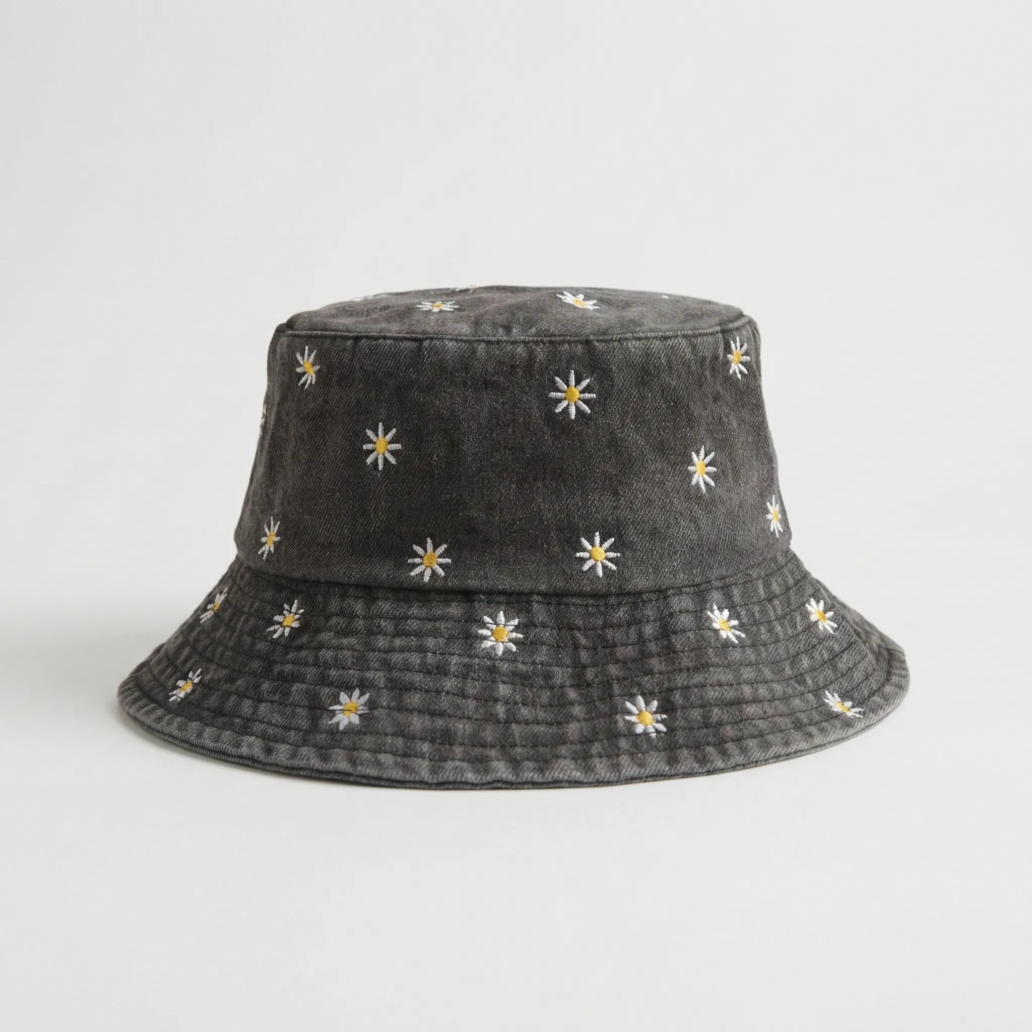 Daisy embroidered bucket hat with wide brim and washed denim finish