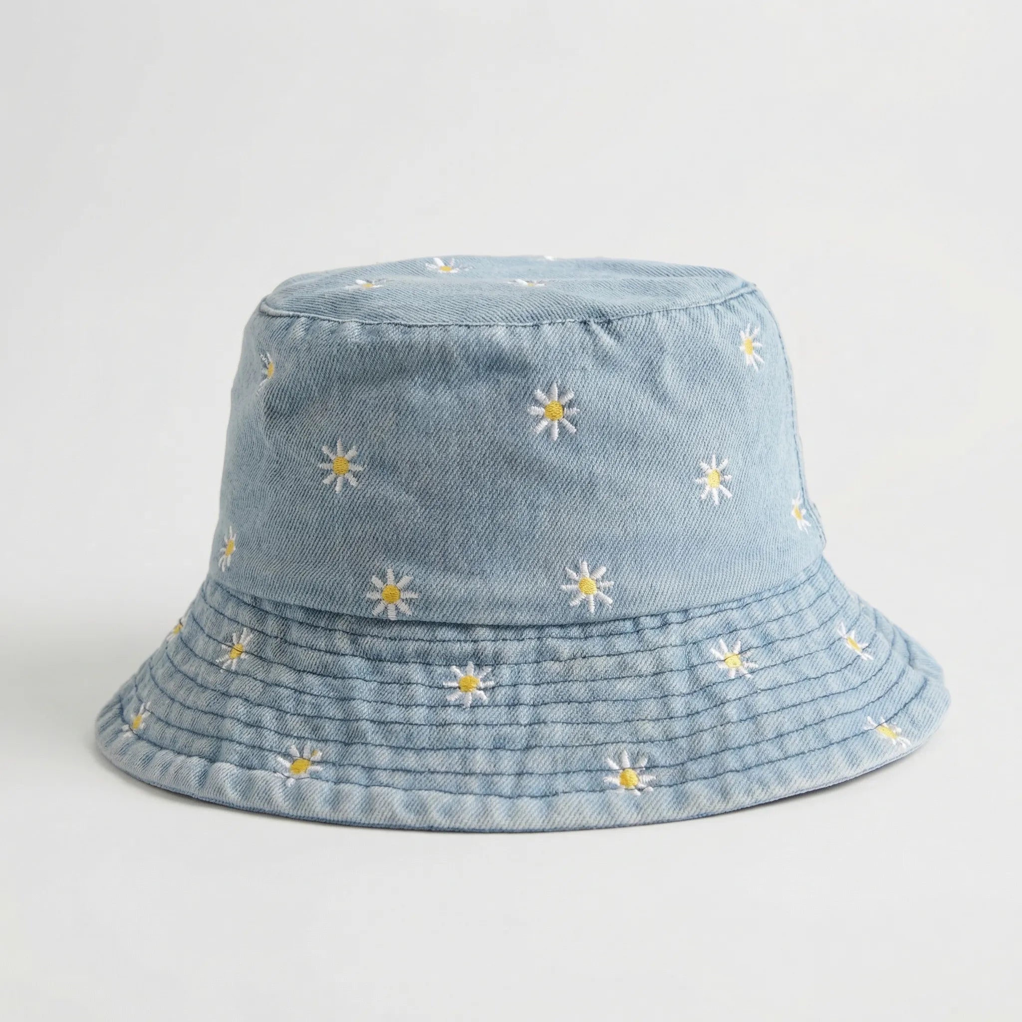 Daisy embroidered bucket hat with wide brim and washed denim finish