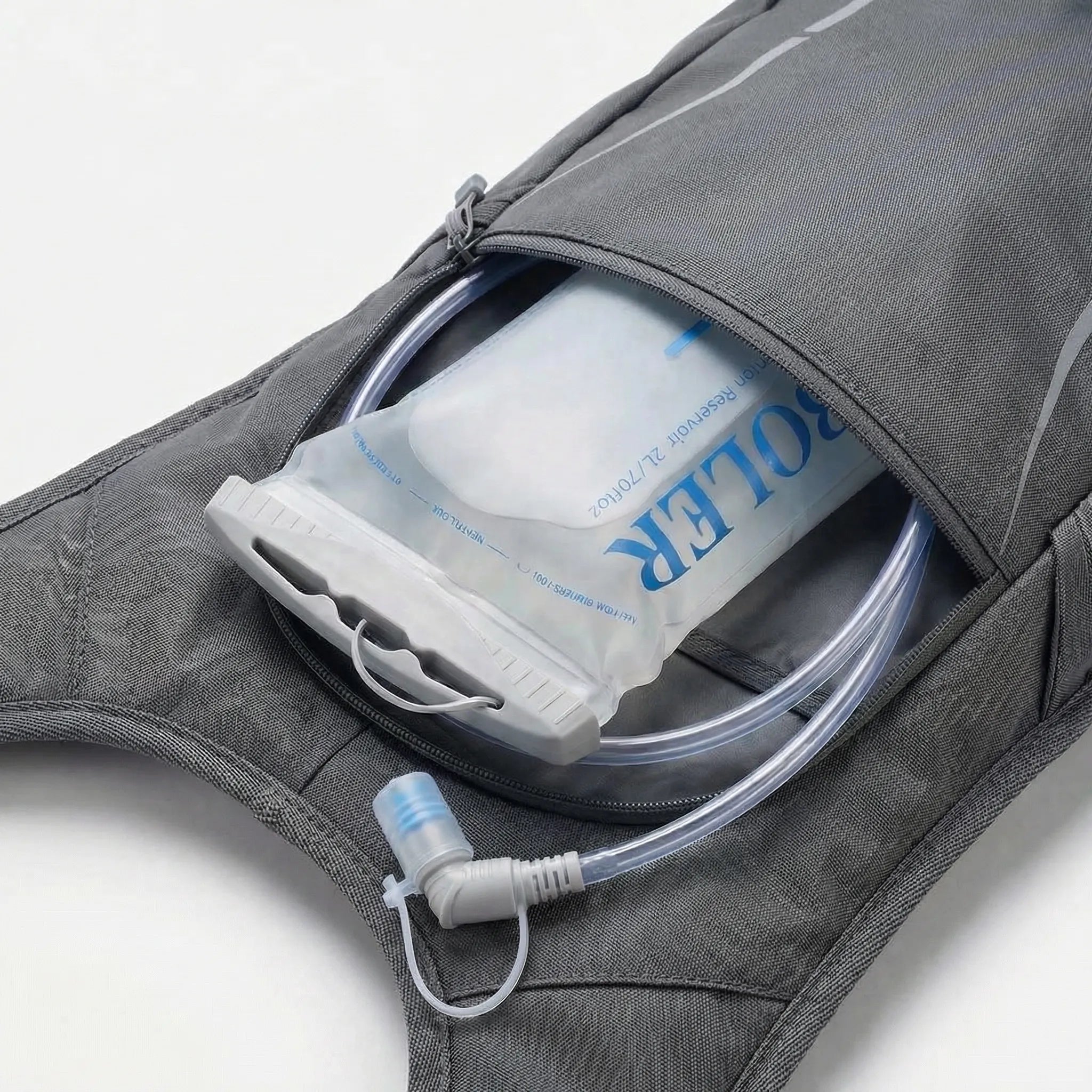 Portable hydration reservoir with flexible drinking tube and bite valve
