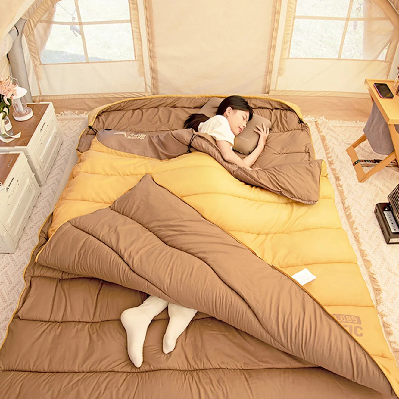 Two-person camping sleeping bag with double envelope design