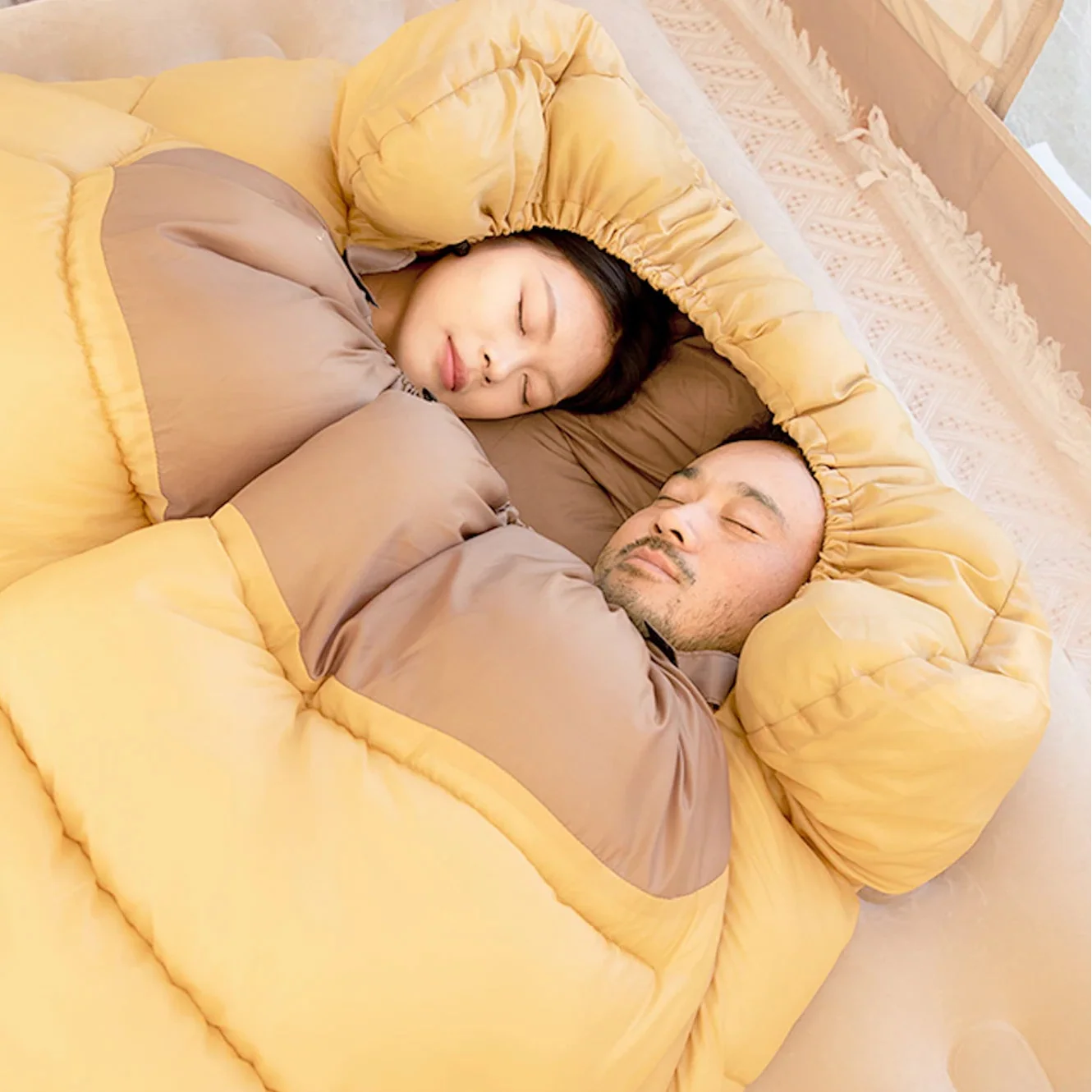 Two-person camping sleeping bag with double envelope design