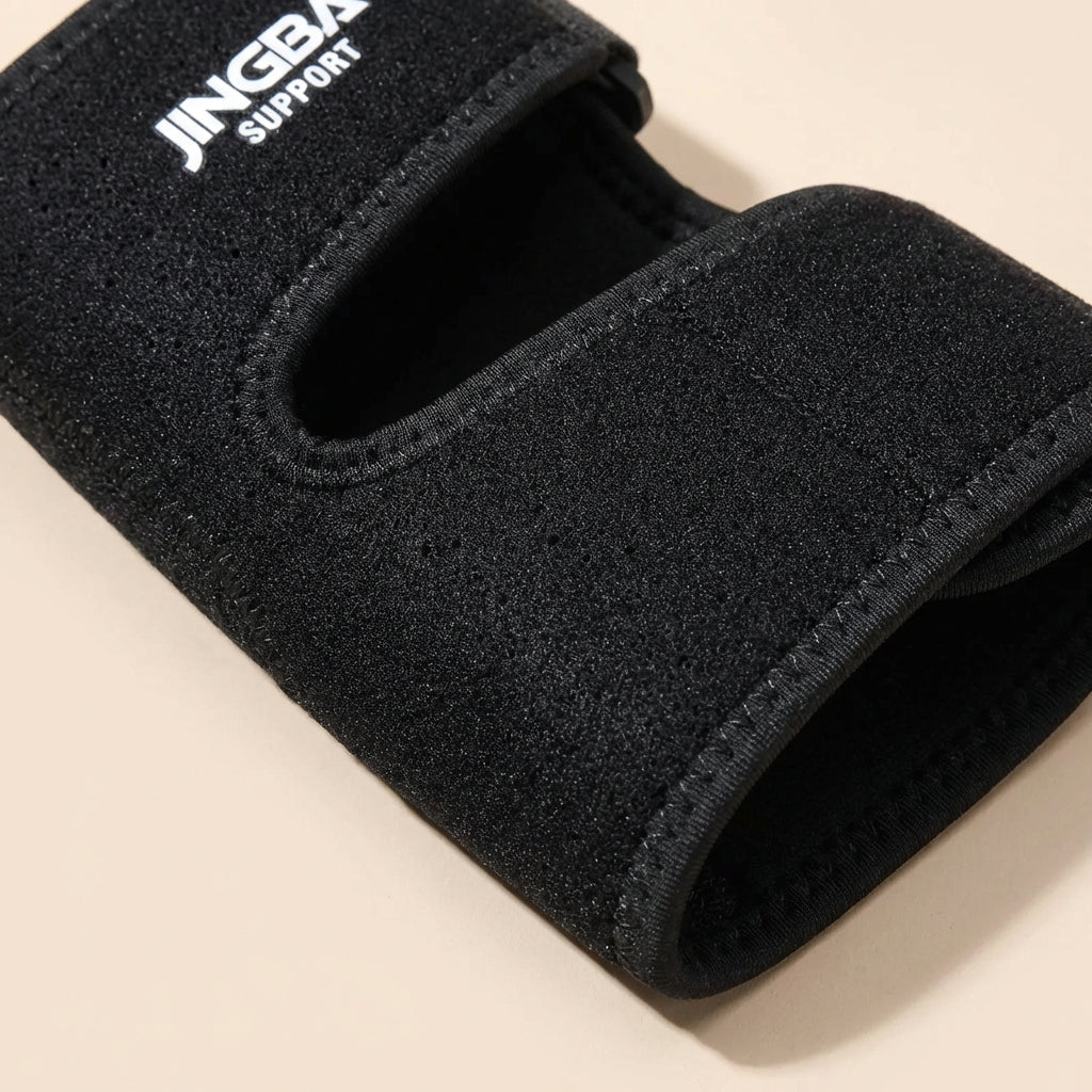 Adjustable elbow compression brace with targeted support and breathable design