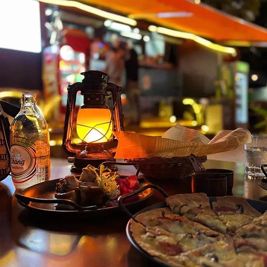 Vintage-style rechargeable flame-effect lantern with portable design