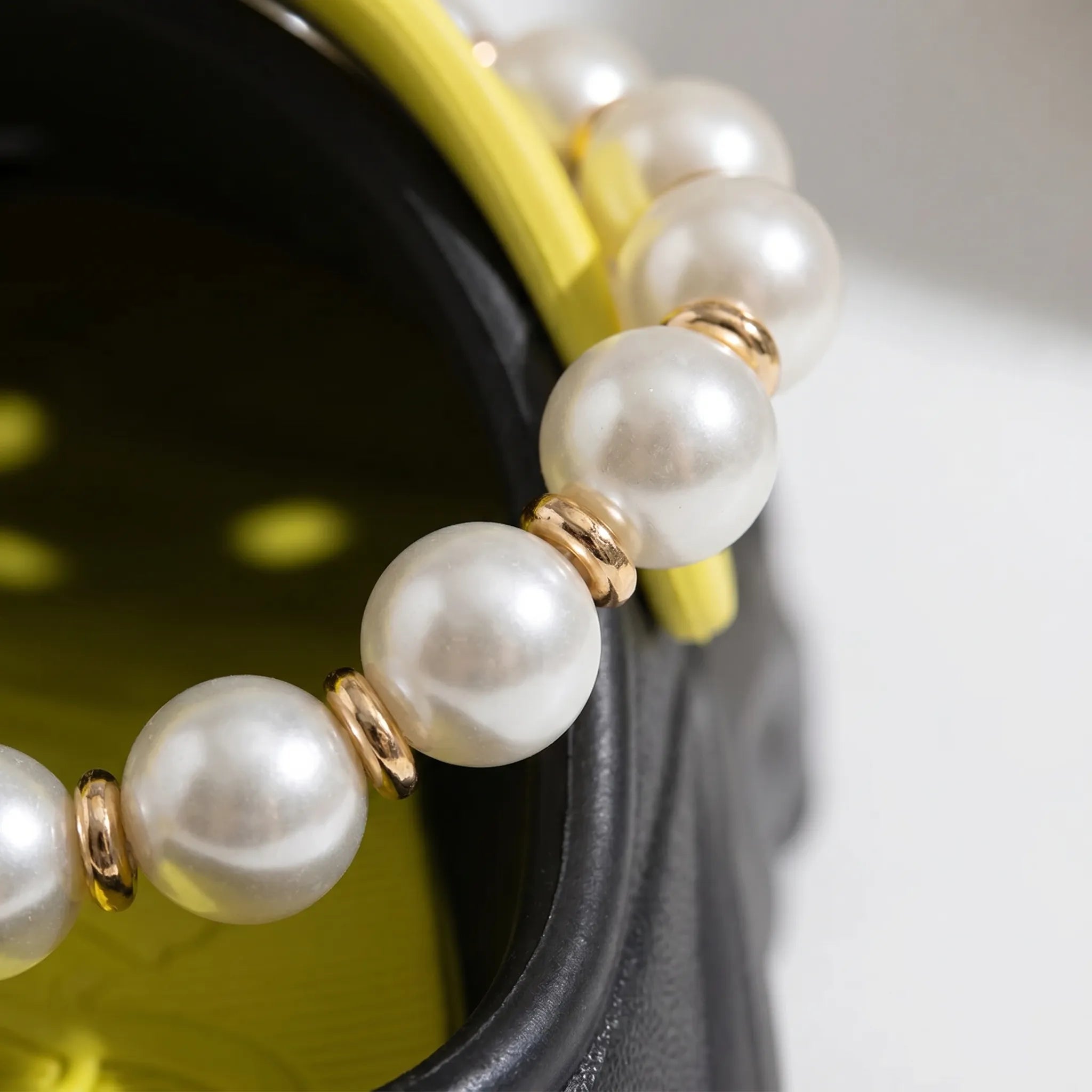 Chunky platform summer clogs with faux pearl chains and flower accents