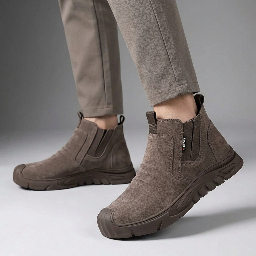 Slip-on safety boot with reinforced toe protection and puncture-resistant sole