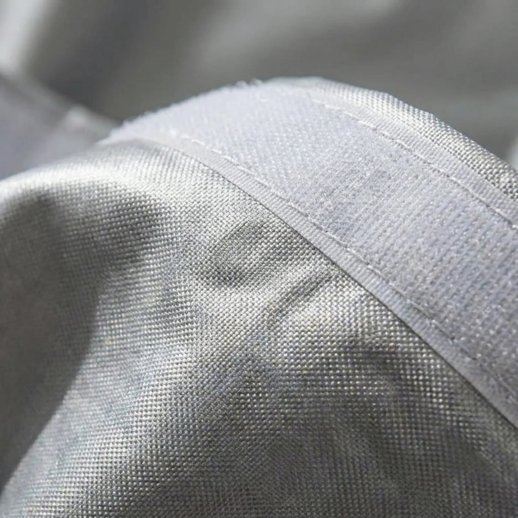 Self-adhesive window sunshade with double-sided reflective finish