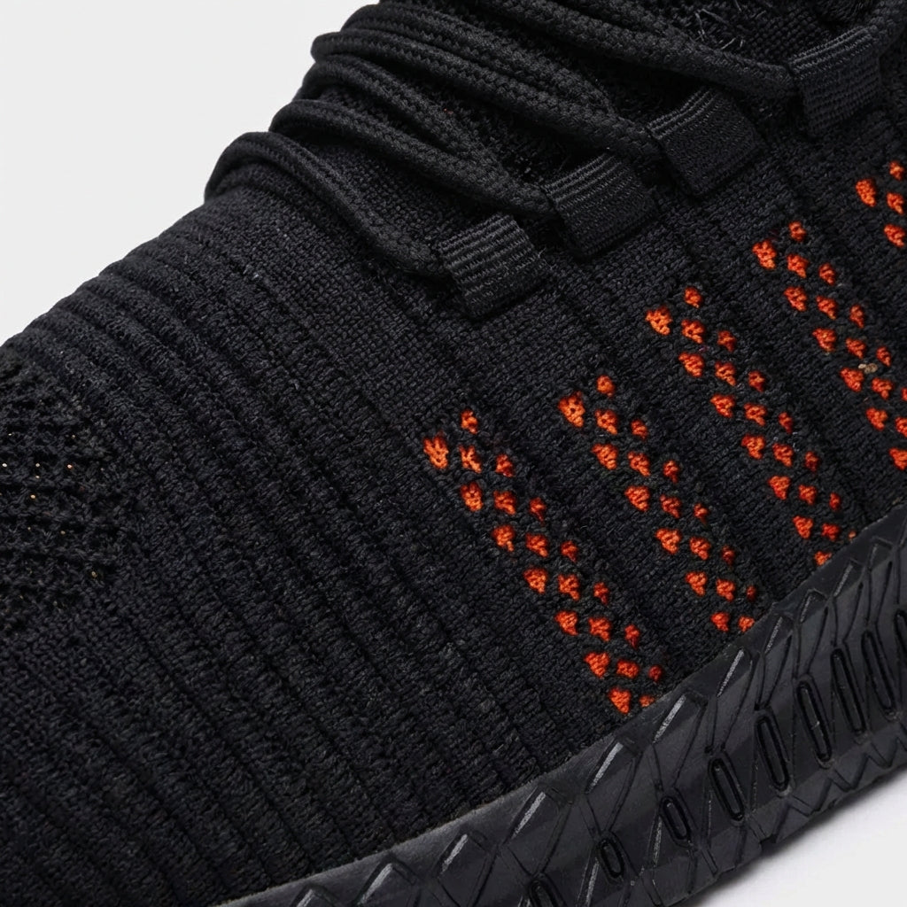 Lightweight safety sneaker with breathable mesh and slip-resistant sole