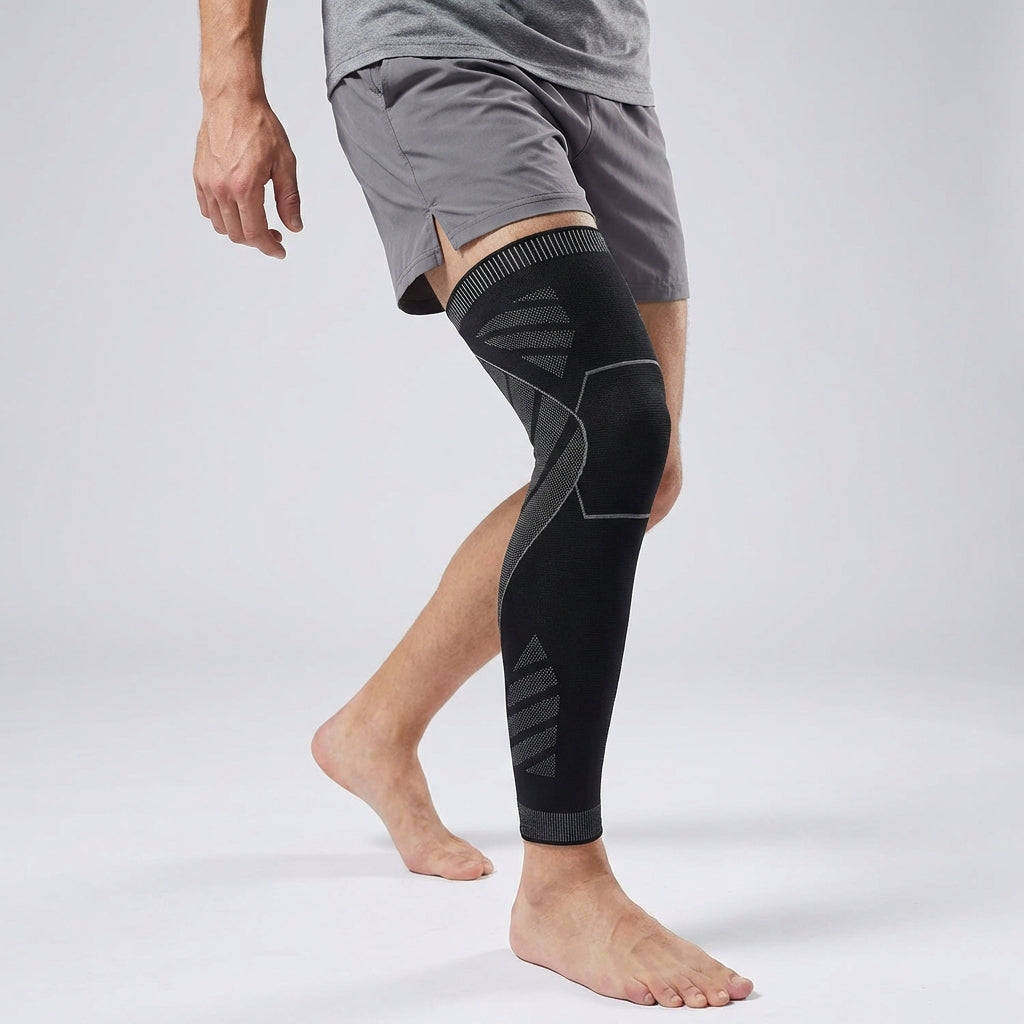 Full leg compression sleeve with targeted knee support and silicone grip band