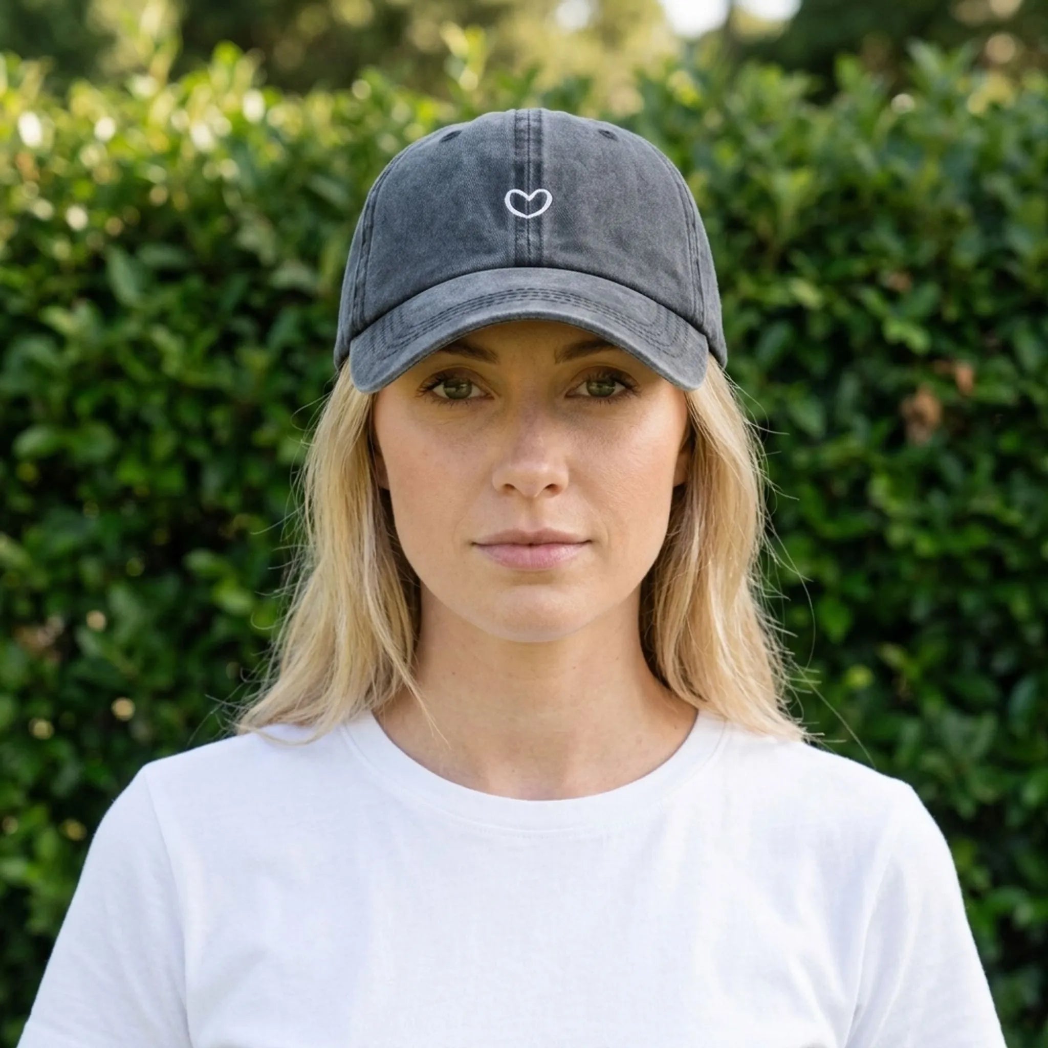 Retro ponytail cap washed black with embroidered heart detail