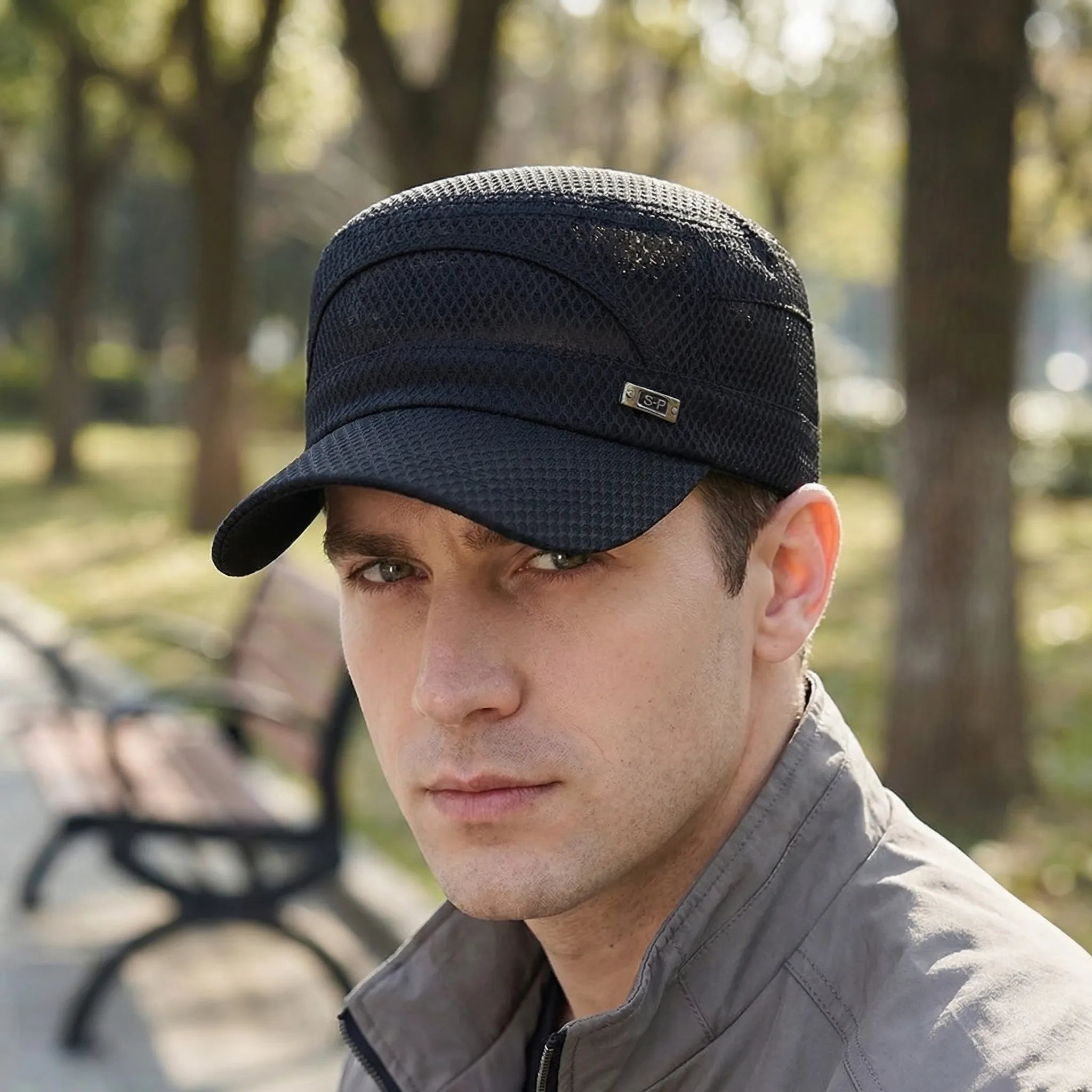 Breathable mesh flat-top cap with military-inspired silhouette and adjustable strap