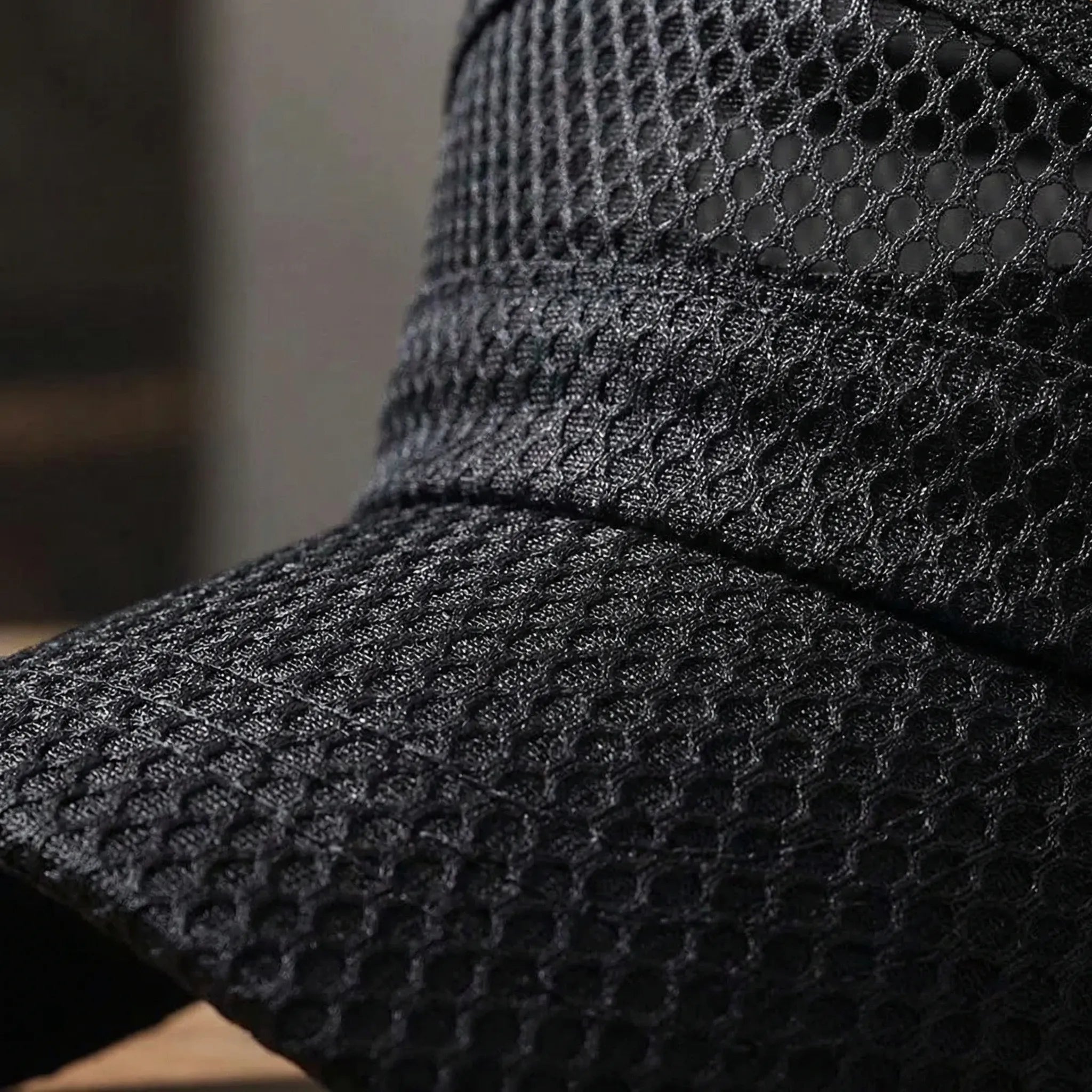 Breathable mesh flat-top cap with military-inspired silhouette and adjustable strap