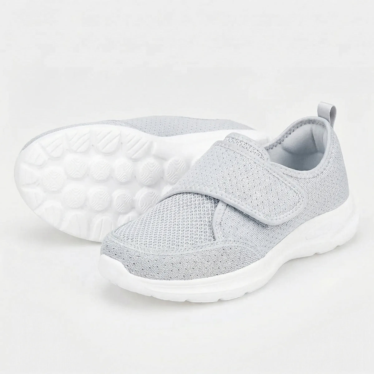 Wide fit orthopedic shoe with adjustable hook-and-loop strap