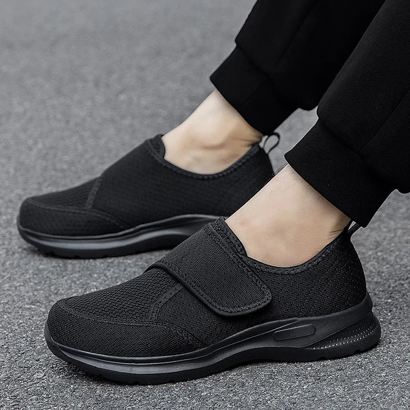 Wide fit orthopedic shoe with adjustable hook-and-loop strap
