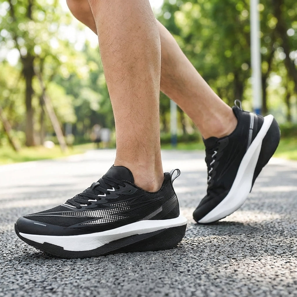Running shoe with breathable mesh upper and cushioned sole