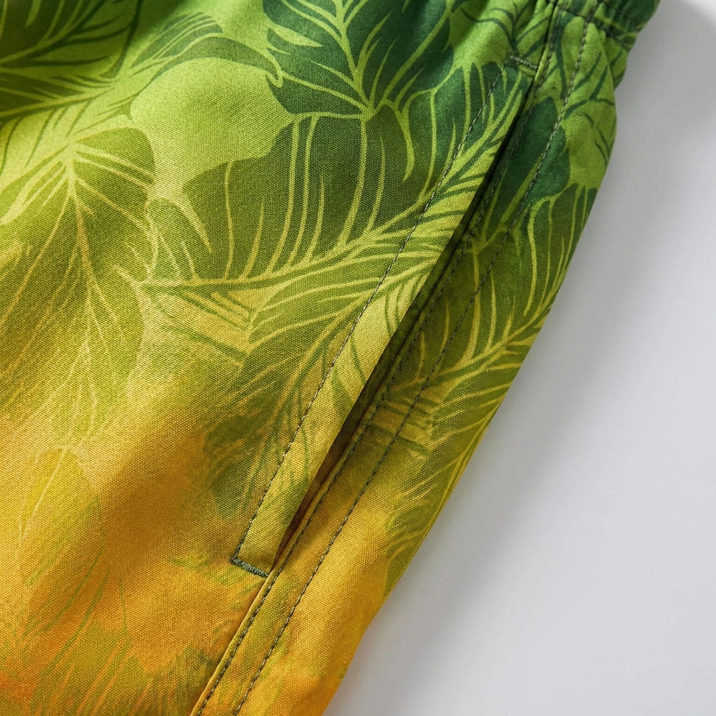 Men's loose fit board shorts with palm gradient pattern and quick-drying fabric