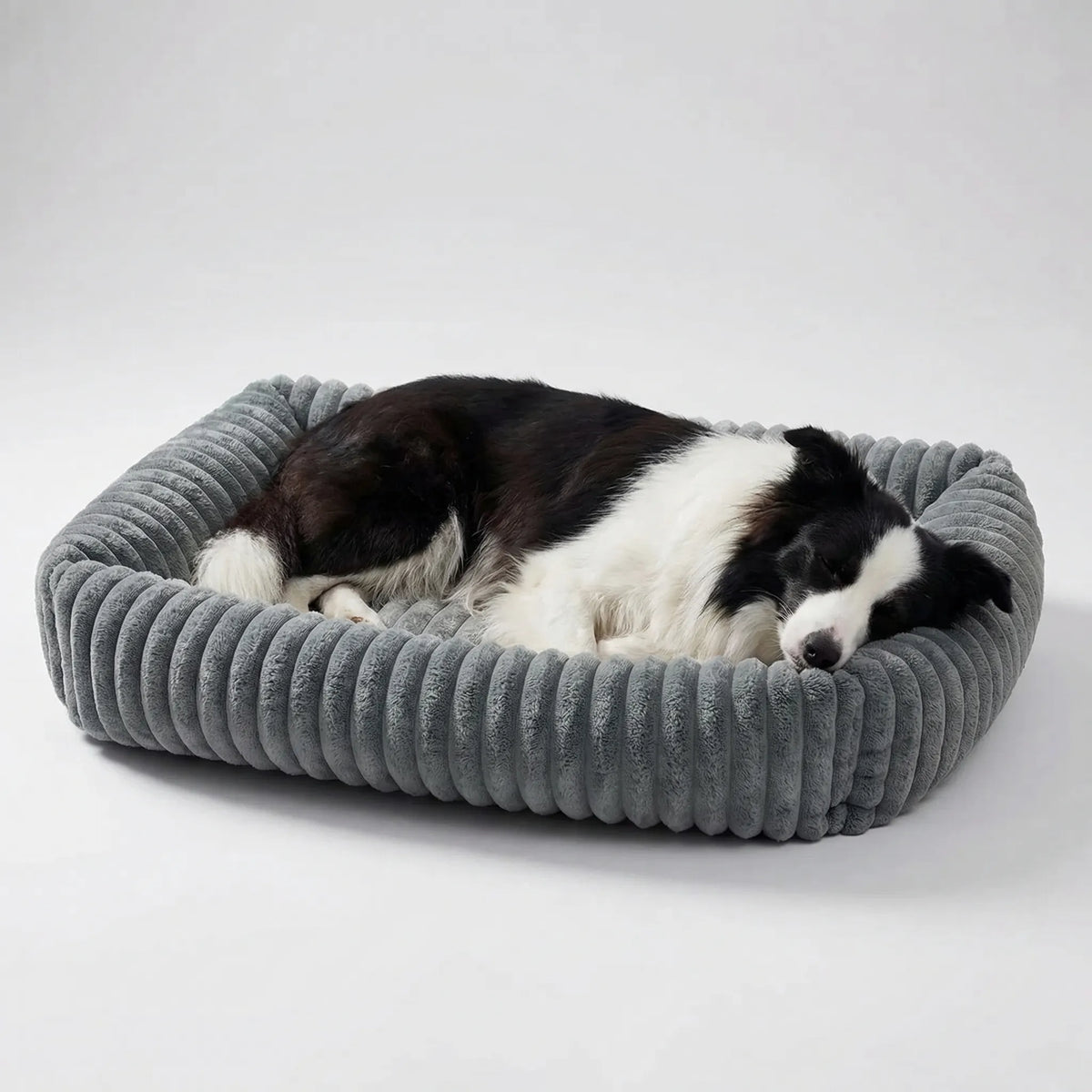 Orthopedic plush dog bed with raised sides for large dogs