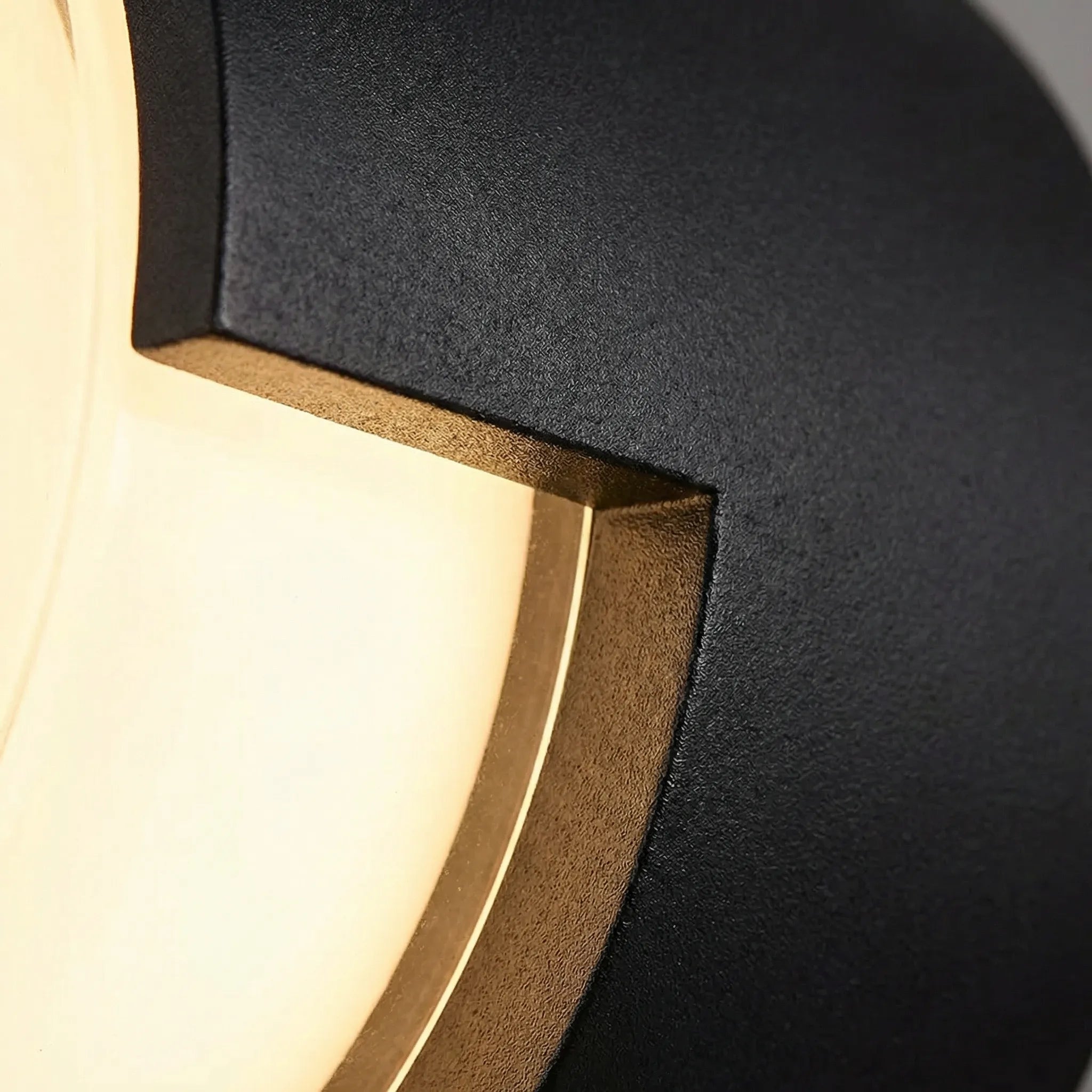 Round LED wall light with warm and cool white options for indoor and outdoor use