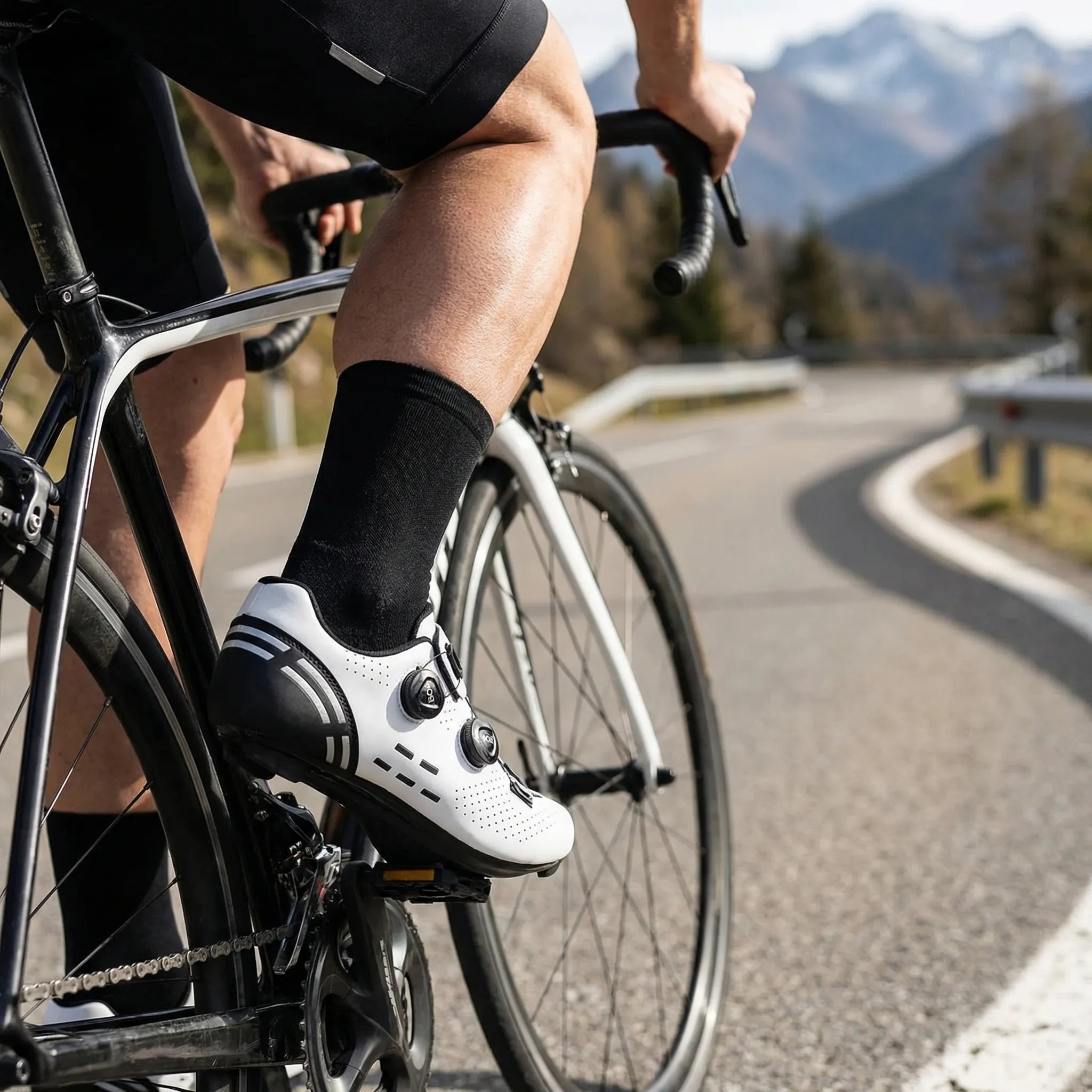 Road cycling shoe with dual rotary dial closure and Shimano cleat mount
