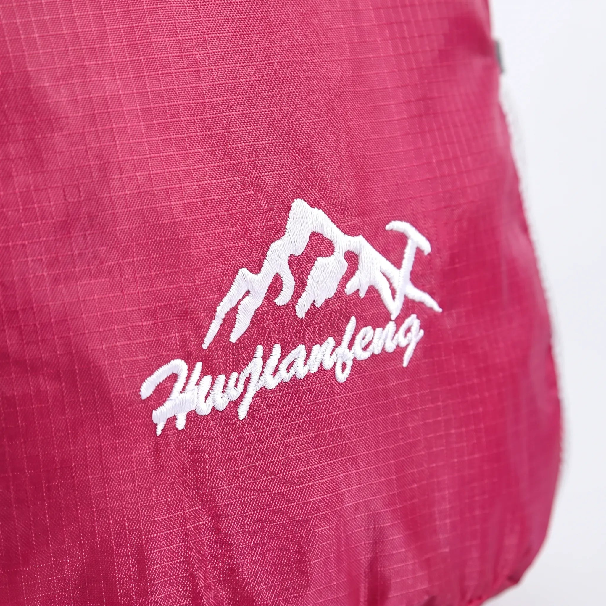 Foldable lightweight daypack with water-repellent outer shell and ventilated mesh straps