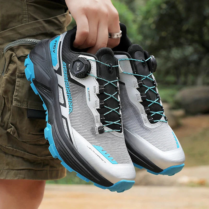 Low cut trail running shoe with breathable mesh and aggressive outsole
