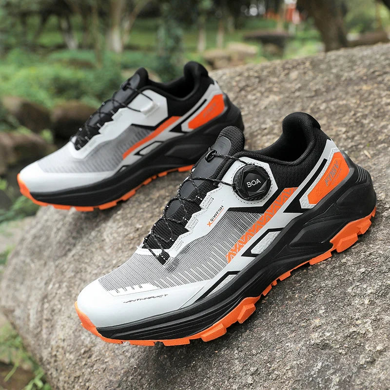 Low cut trail running shoe with breathable mesh and aggressive outsole