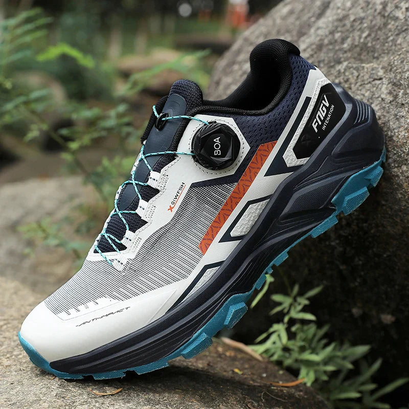 Low cut trail running shoe with breathable mesh and aggressive outsole