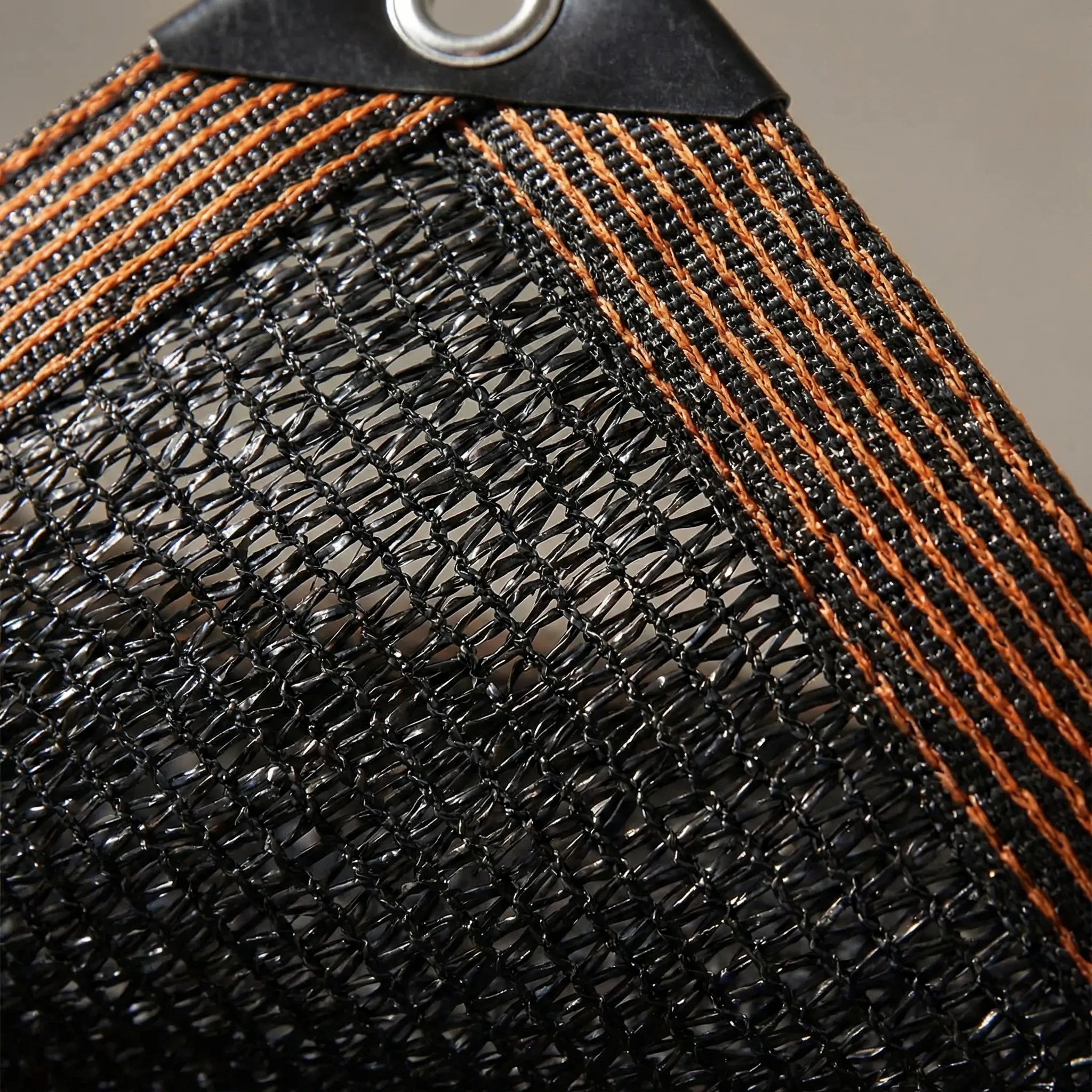 Heavy duty shade cloth with reinforced edges and grommets for outdoor patio