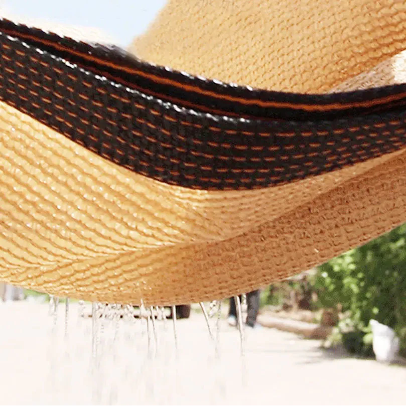 High coverage shade cloth with reinforced edges and metal eyelets for patio and garden use