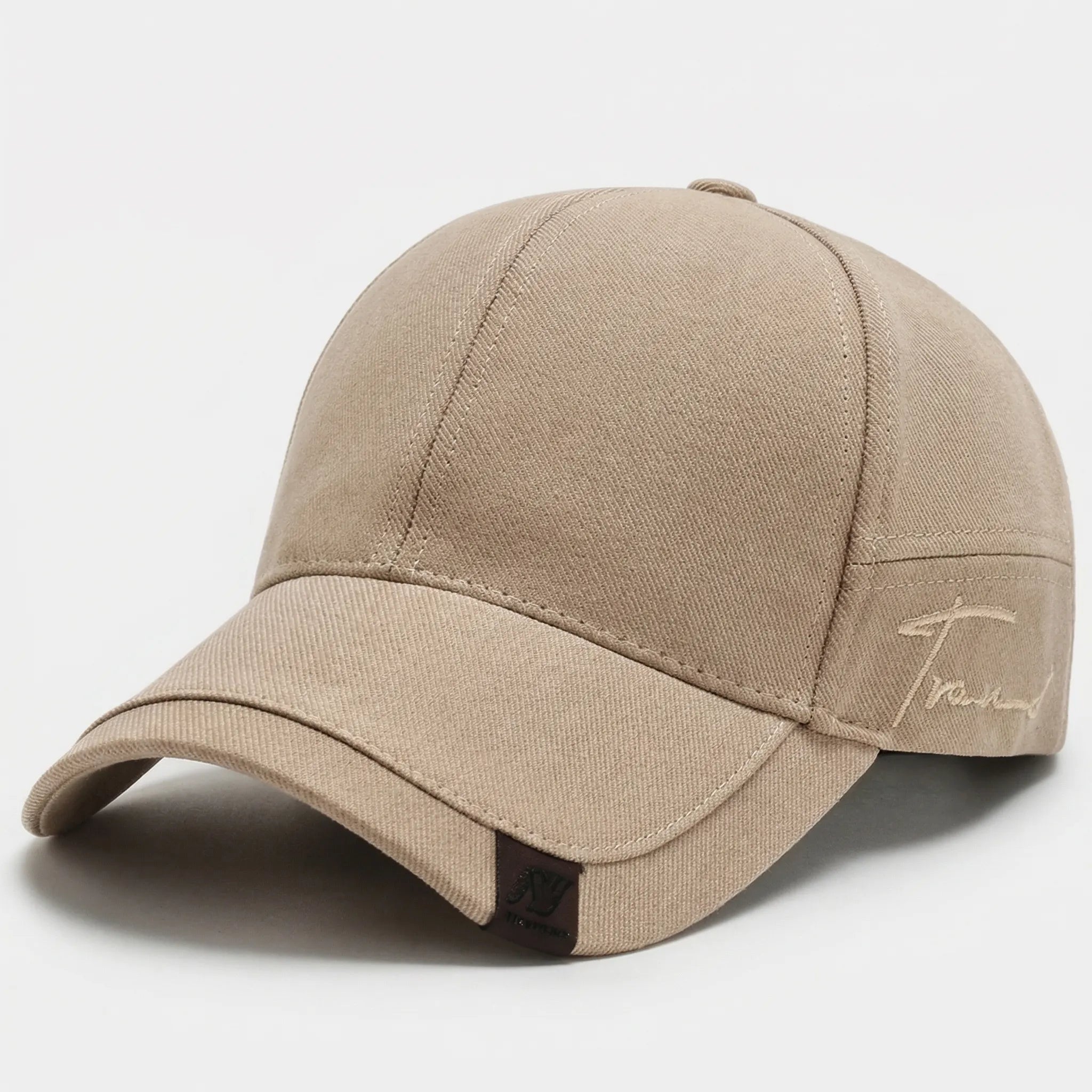 Minimalist baseball cap with curved peak and adjustable back strap