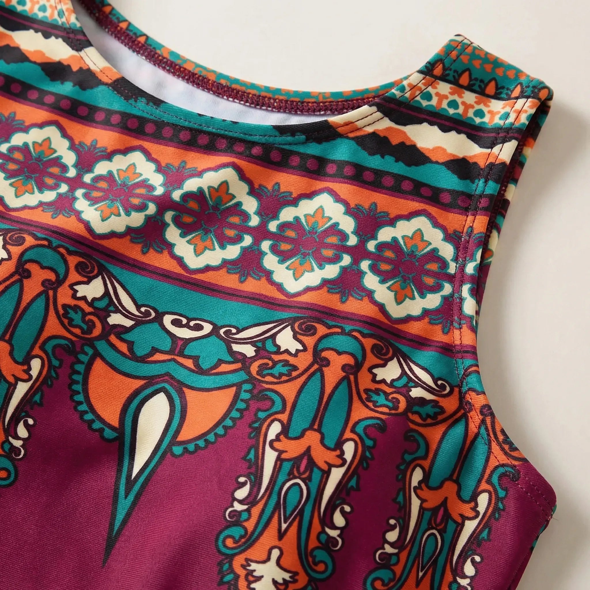 One-piece swimsuit with floral print and high neckline